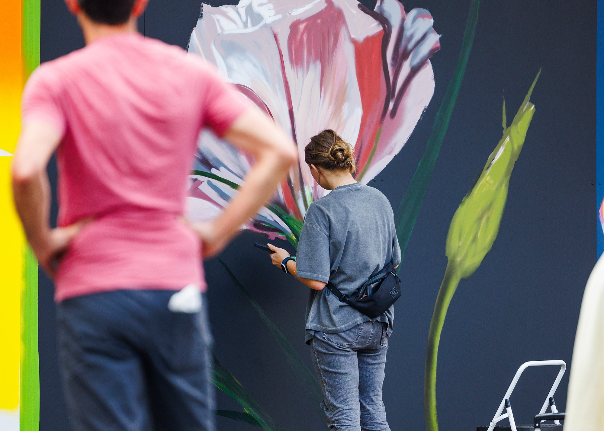 Public art mural in progress at The Art Yard outdoor gallery in Atlanta.