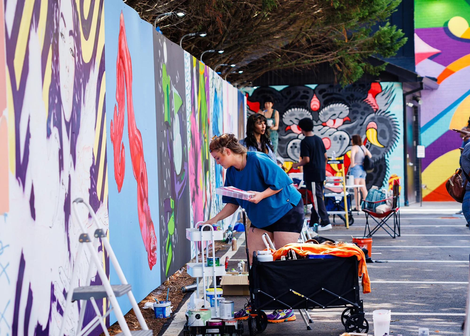 Large-scale mural walls at The Art Yard, a street art destination in Atlanta.