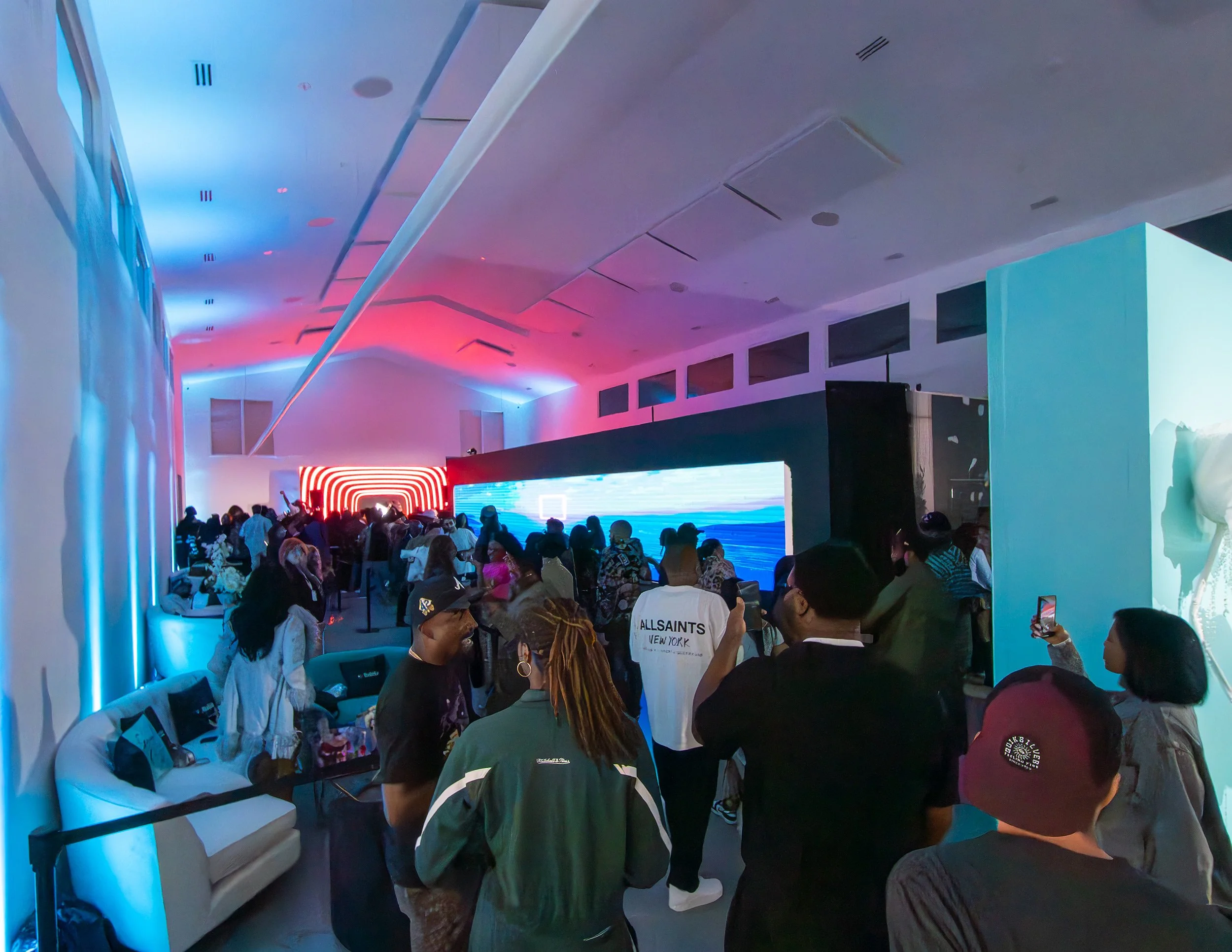 Guests attending a brand activation event at ABV Gallery in East Atlanta Village, Atlanta.