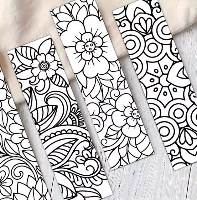 Black and white line drawings of intricate floral and geometric patterns on bookmarks to b coloured in. 