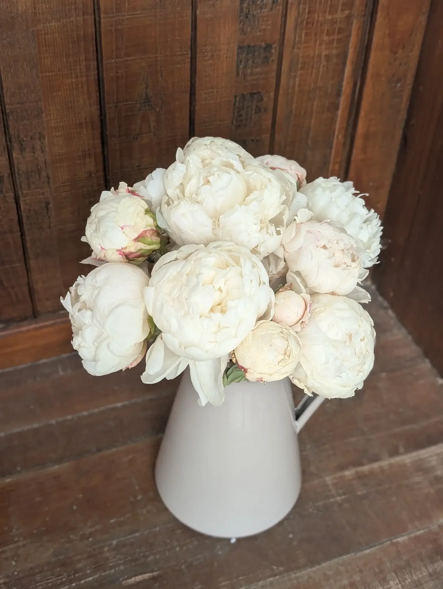 A lush bouquet of premium Sarah Bernhardt peonies from Breemar Flower Farm, part of the spring flower subscription in Ashland, VA.