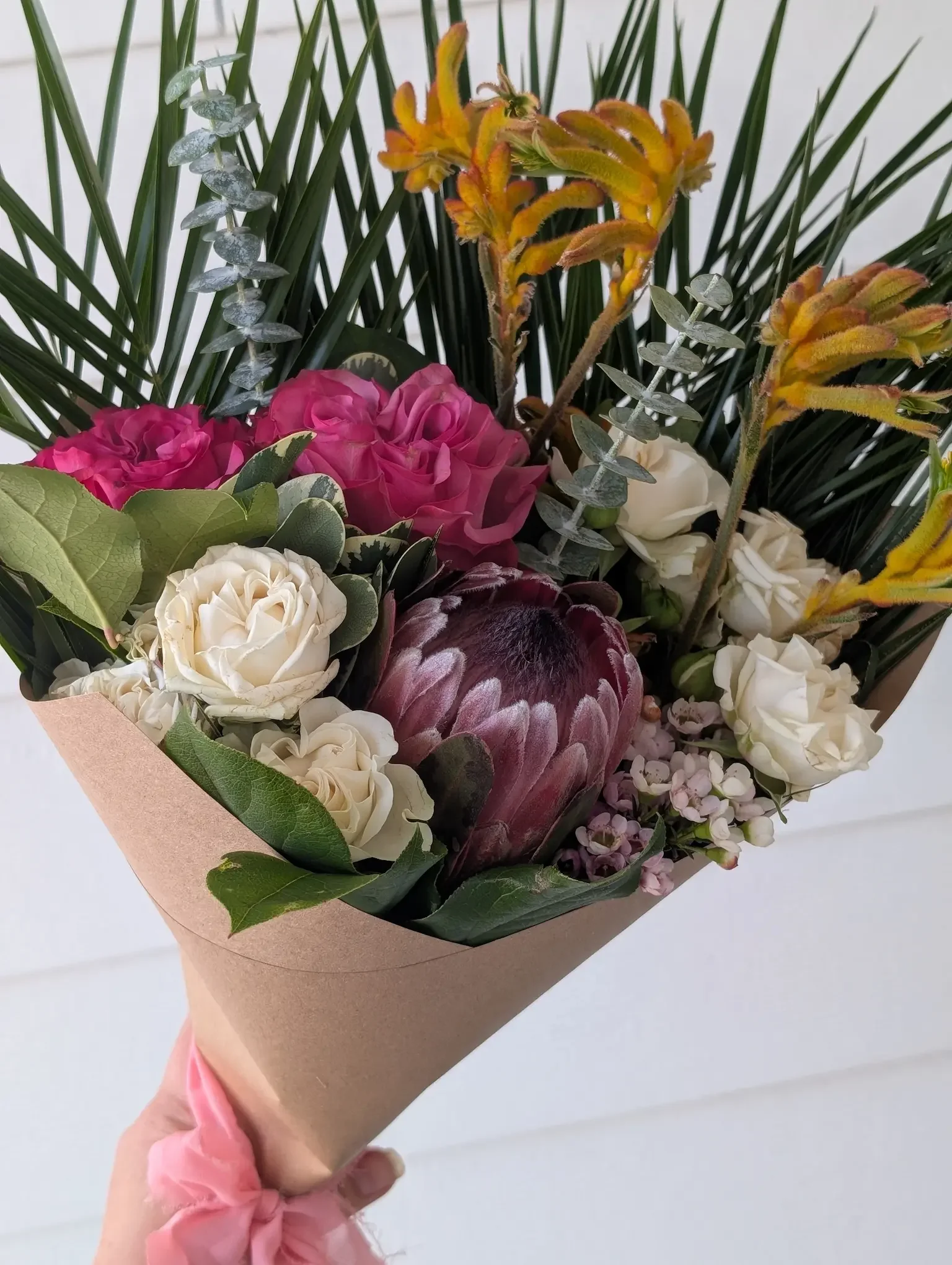 Lush overflowing peony and seasonal flower bouquet for Mother's Day, hand-wrapped at Breemar Flower Farm in Ashland, Virginia