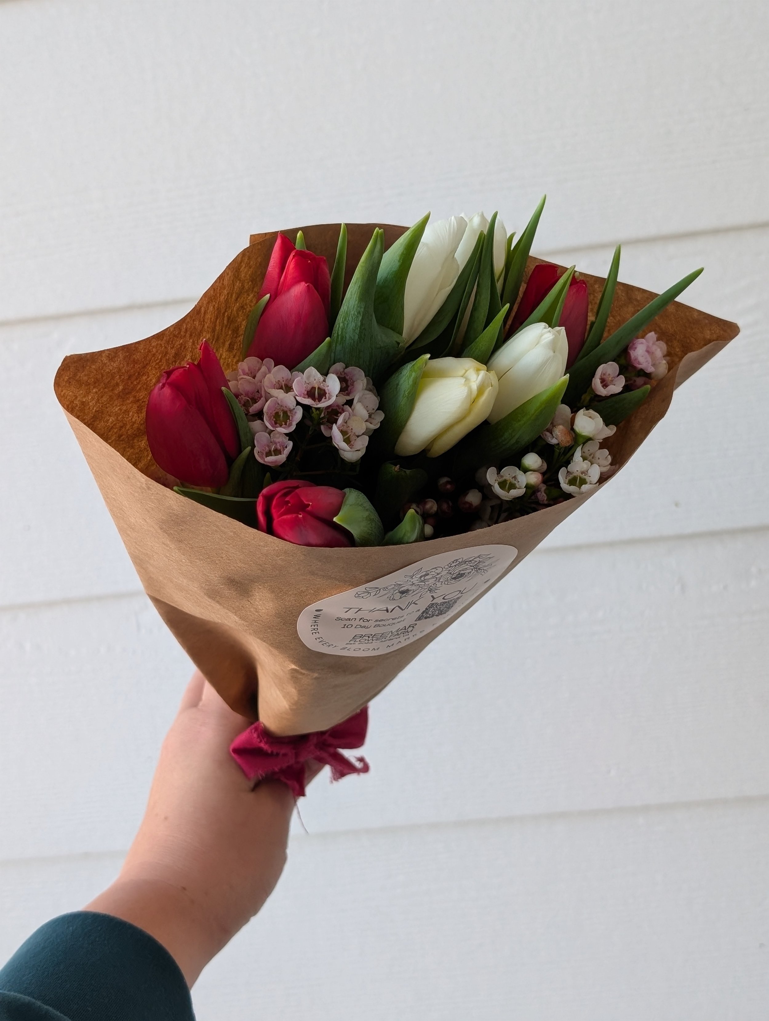 Tulip and Wax Flower Wrapped Bouquet.jpg