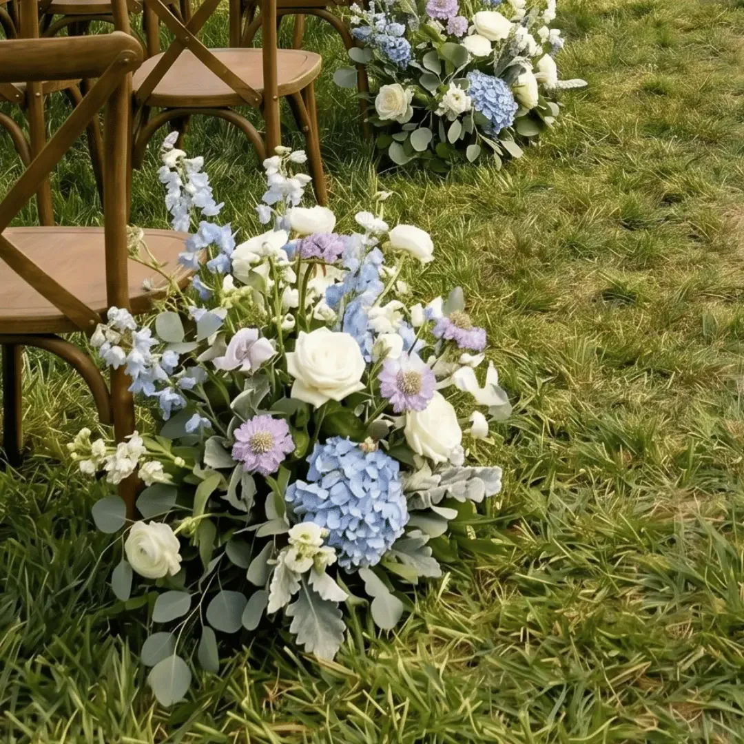 Breemar Flower Farm anniversary arrangement with coral peonies and orange poppies in a white ceramic vase, Ashland VA.
