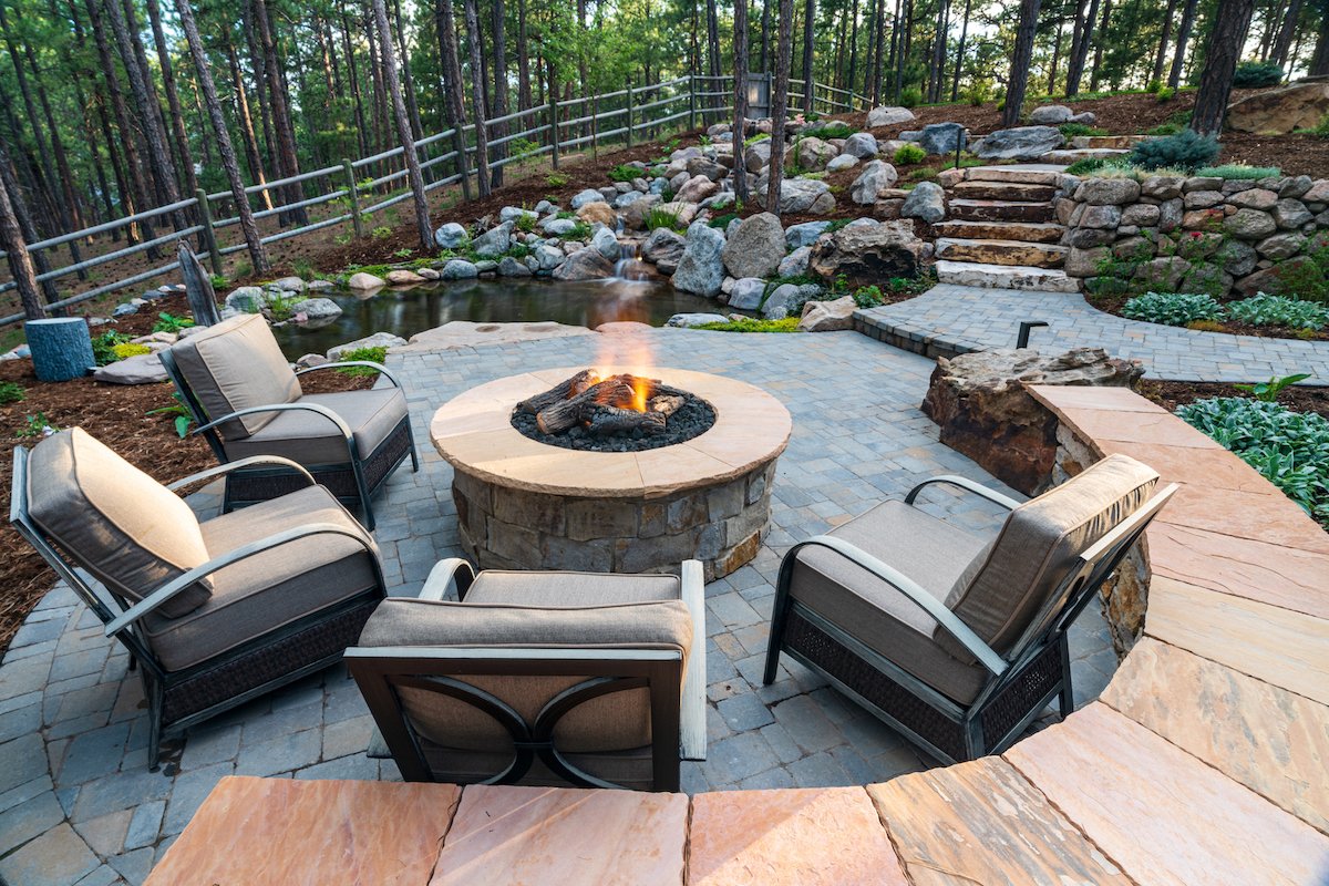 Landscape design with paver patio with fire pit in Castle Rock, Colorado