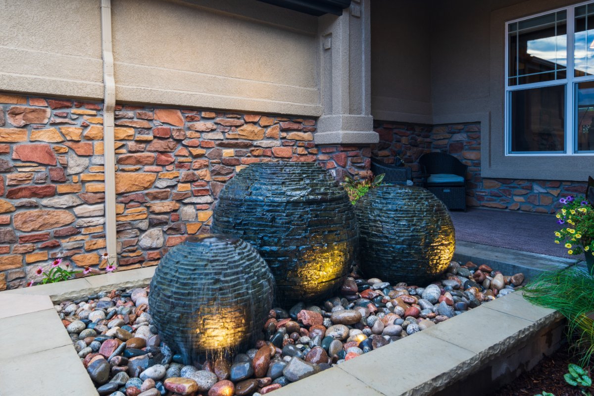 Landscape design with water fountain in Northgate, CO