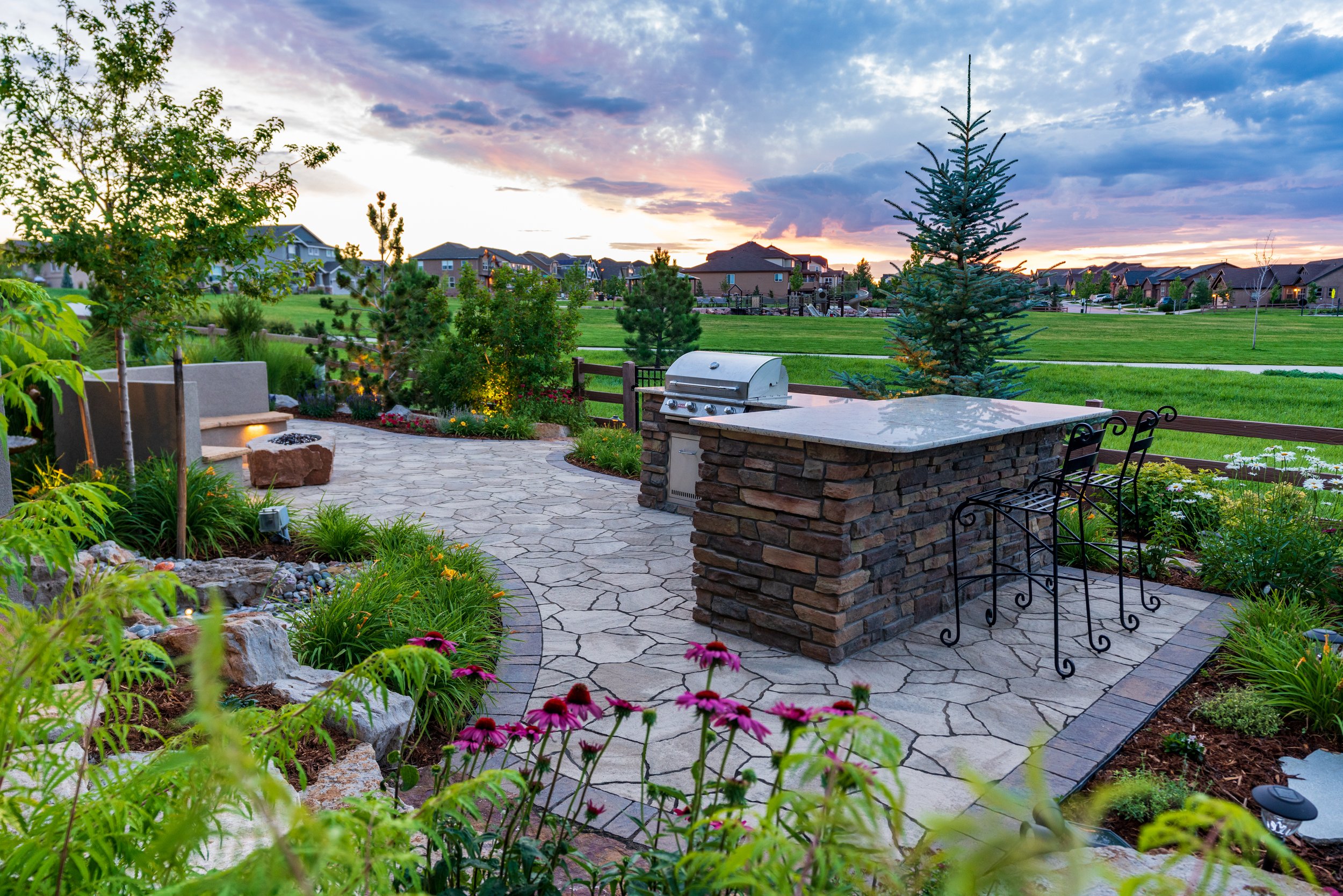 Paver patio with outdoor kitchen in Castle Pines, CO