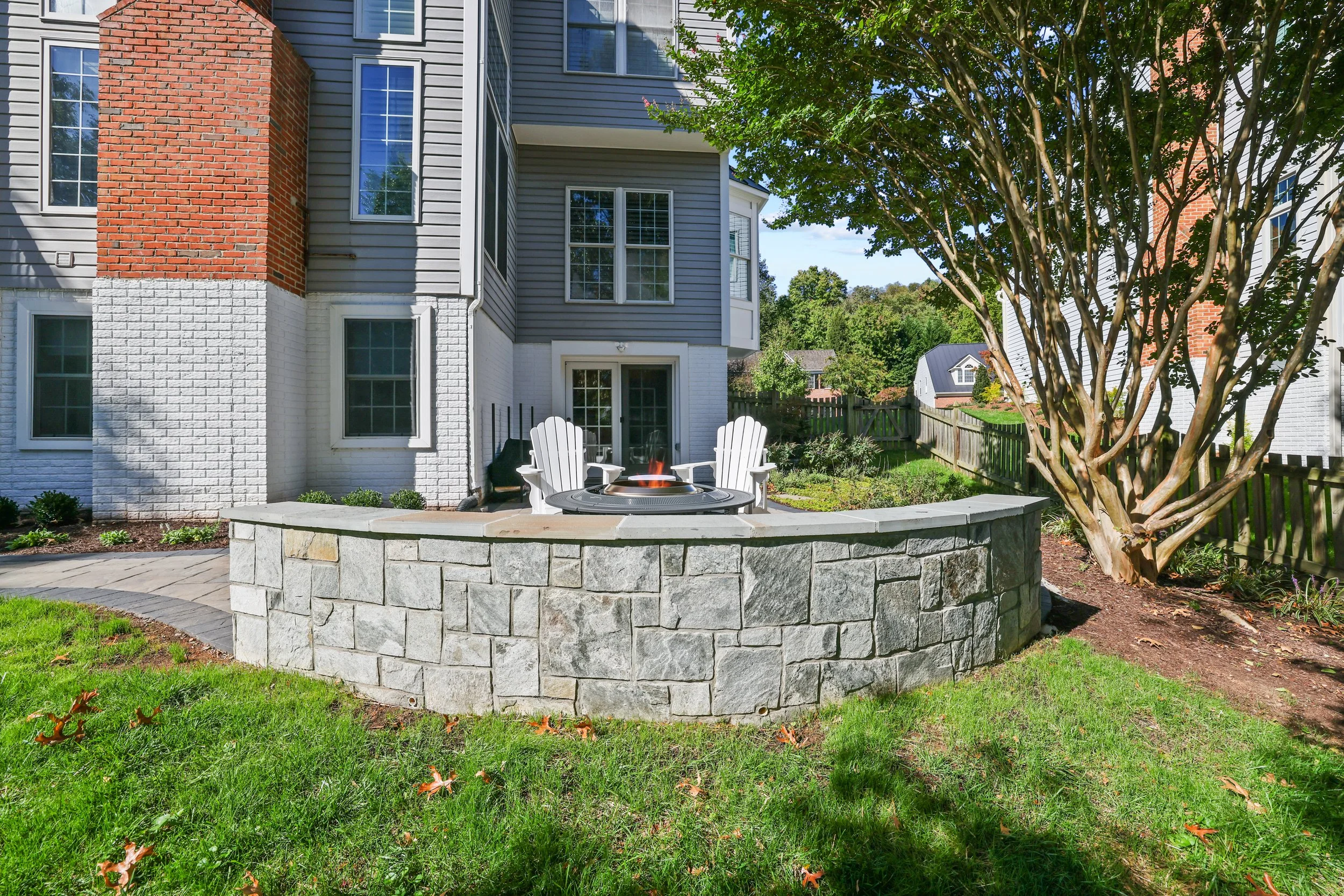 Transform Your Terrain: A Paver Patio and Retaining Wall to Redefine