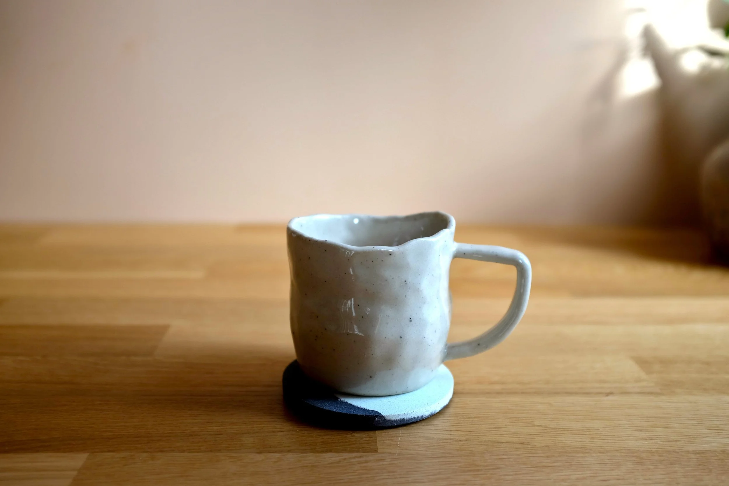 Ivory Black Drinks Coaster (1).JPG