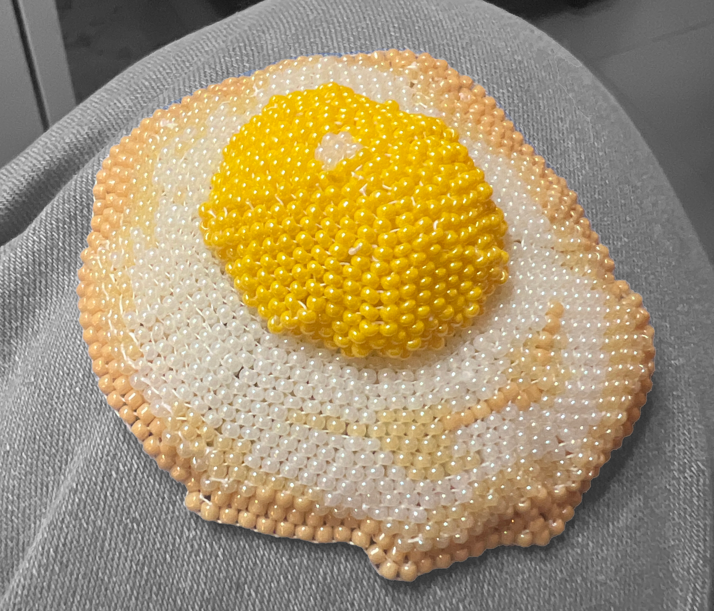 DE20260324-01. 
Glass seed beads, cotton thread. 
$35.00