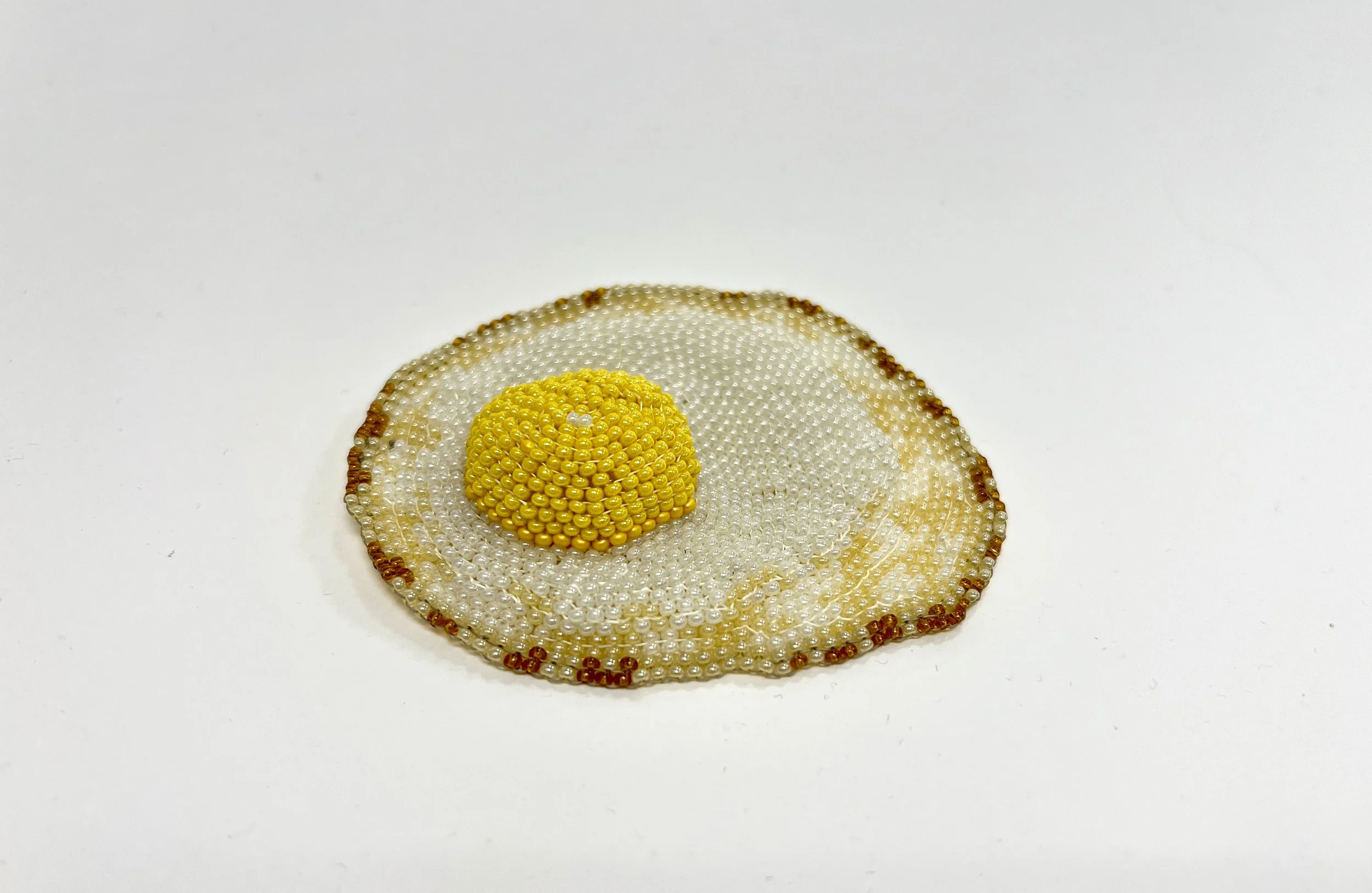 ** SOLD **
Yes (Feeling Fried? series)
Alt Title: DE20260412-03.
1" x 3.5" x 3"
Glass seed beads, polyester thread. 
$70.00 