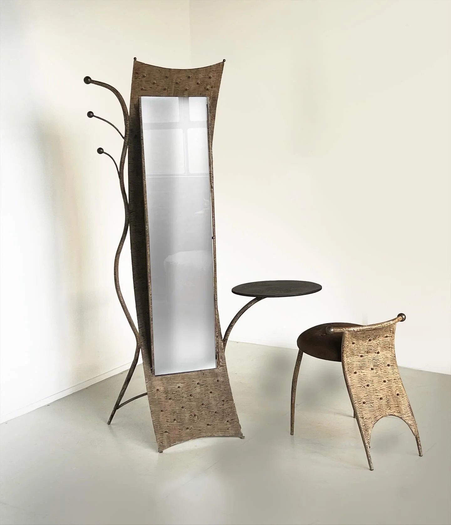 SOLD: A sculptural composition that brings together a mirror, coat rack, dressing table, and stool. Each element grows from the next in a continuous gesture, creating a form that feels both deliberate and organic. The piece pushes beyond conventional