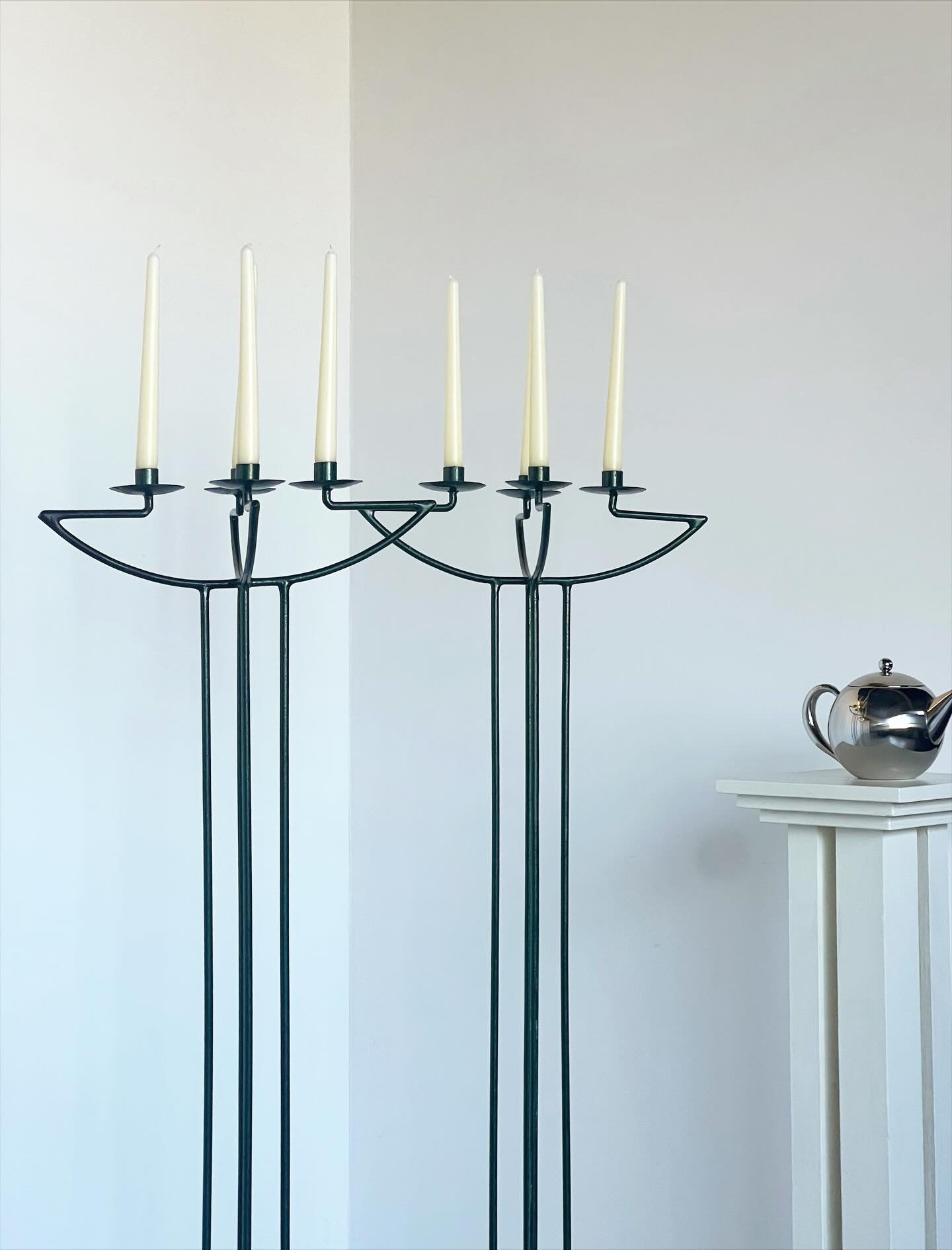 [Sold] Elegant pair of modernist candelabra pillars in striking deep racing green. Clean linearity and symmetrical form. Positioned on quad ball feet. 

Available items sale + hire are available on our website