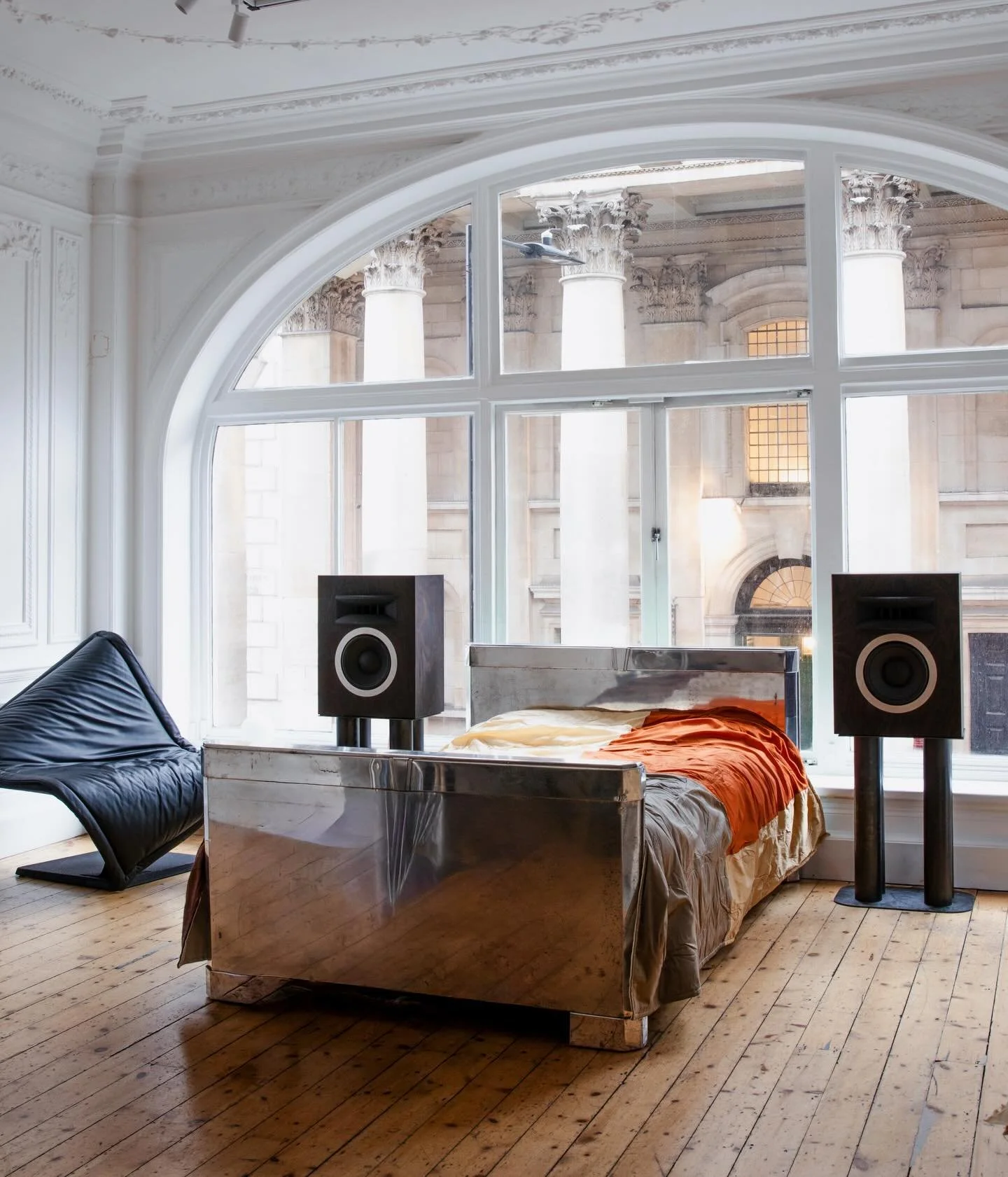 A post war polished aluminium bed frame. Constructed in sheet aluminium with faceted edges and deco motif centralised detail, the pieces reflect the material experimentation and industrial clarity of the post-war period.

The mirrored faceted surface