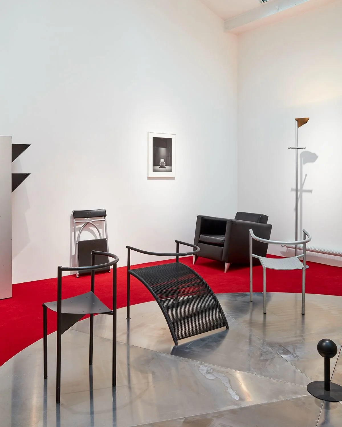 Philippe Starck&rsquo;s Pat Conley I (XO), designed in 1985, comes from his earlier, more experimental body of work. A fine tubular steel frame is paired with a sweeping seat curve that gives the piece its architectural character, more structural ges