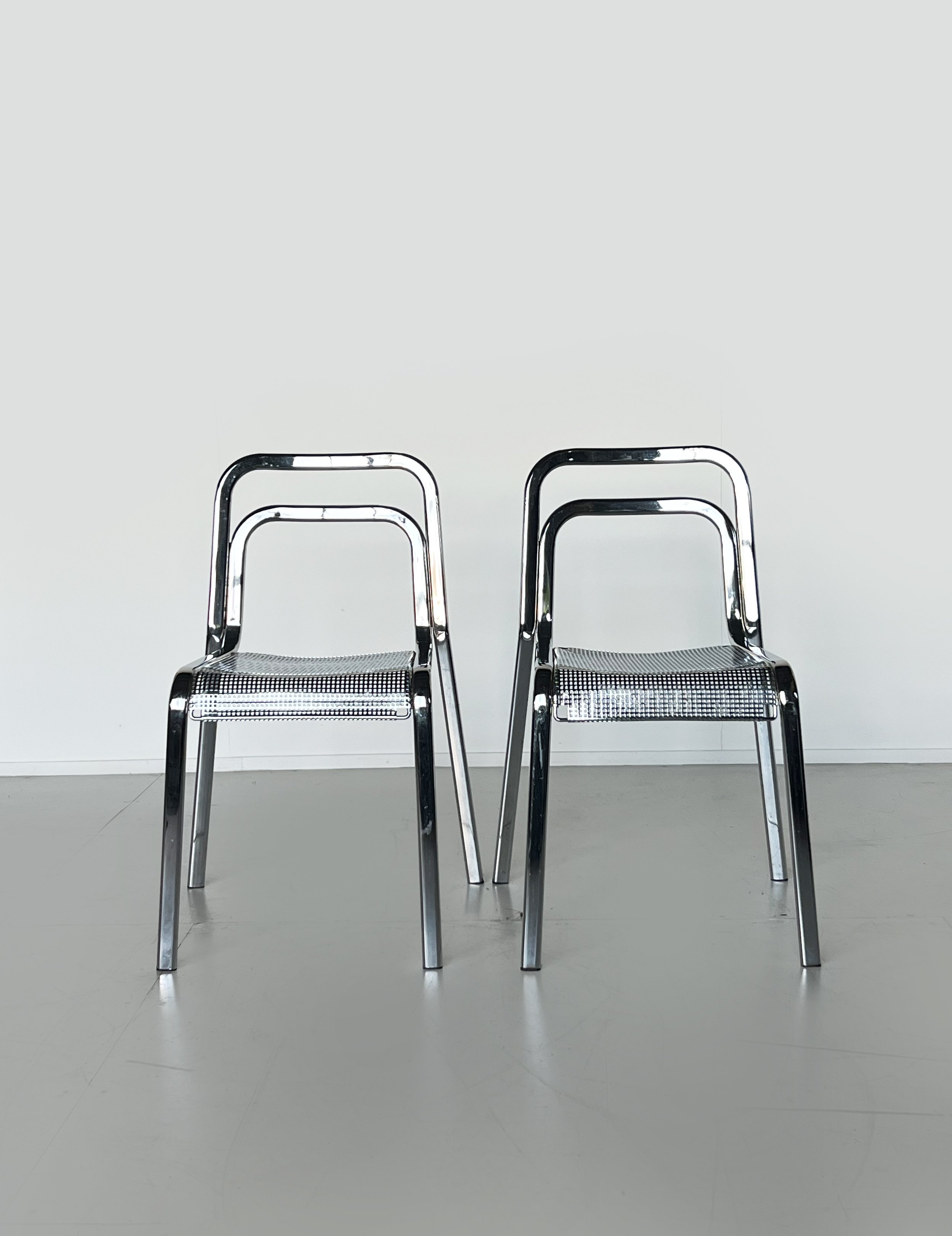 Pair of chrome perforated chair