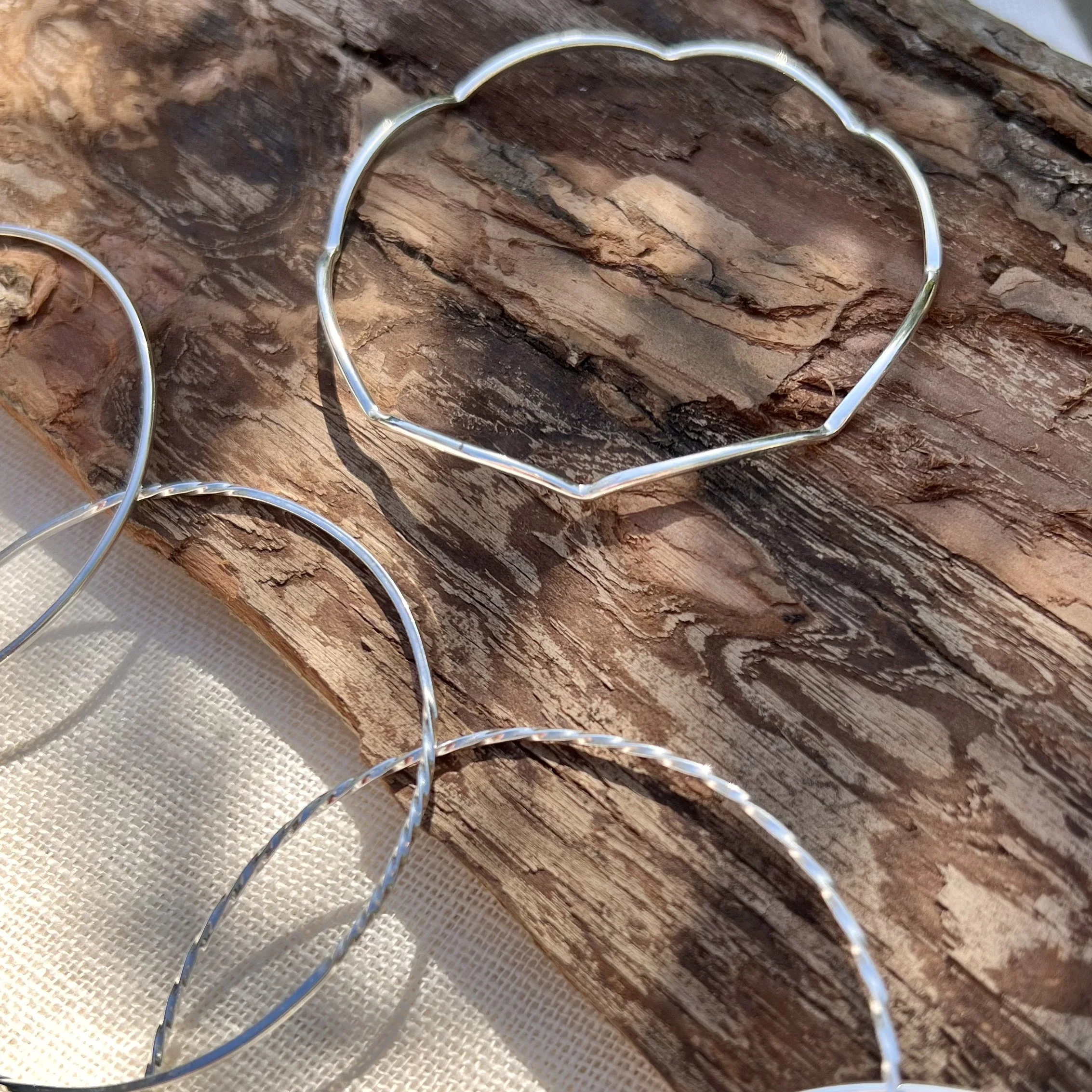 Exquisite handmade scallop design sterling silver bangles