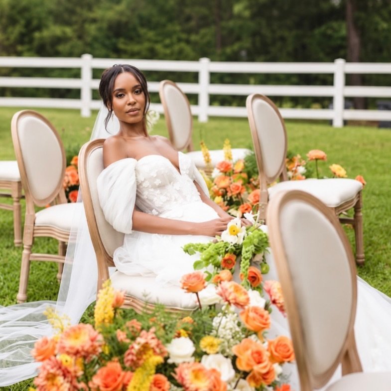 The bride is the moment. The details set the scene. 🤍🍑

Vibrant florals, soft neutrals, and an outdoor setting made for a beautiful &ldquo;I do.&rdquo;

Venue: @theivyontheplains
Planner: @_eventsbymesita
Photo: @andrebrownphoto
HMUA: @jayleidesign