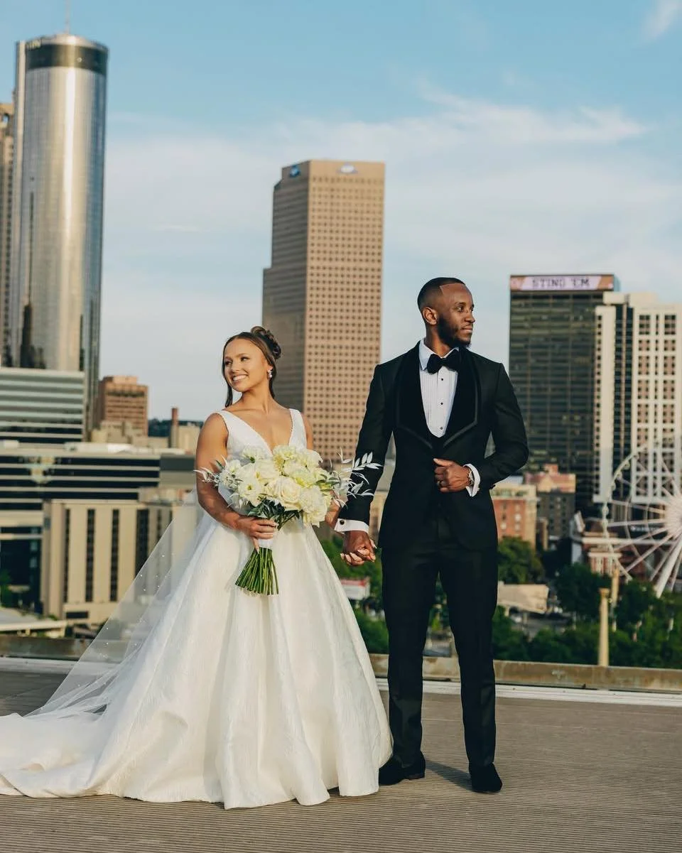 Atlanta&rsquo;s skyline set the backdrop for a celebration filled with romance, white blooms, and moments like this.

Your wedding deserves a setting that feels like your story. Start planning with Events by Mesita through the consultation link in ou