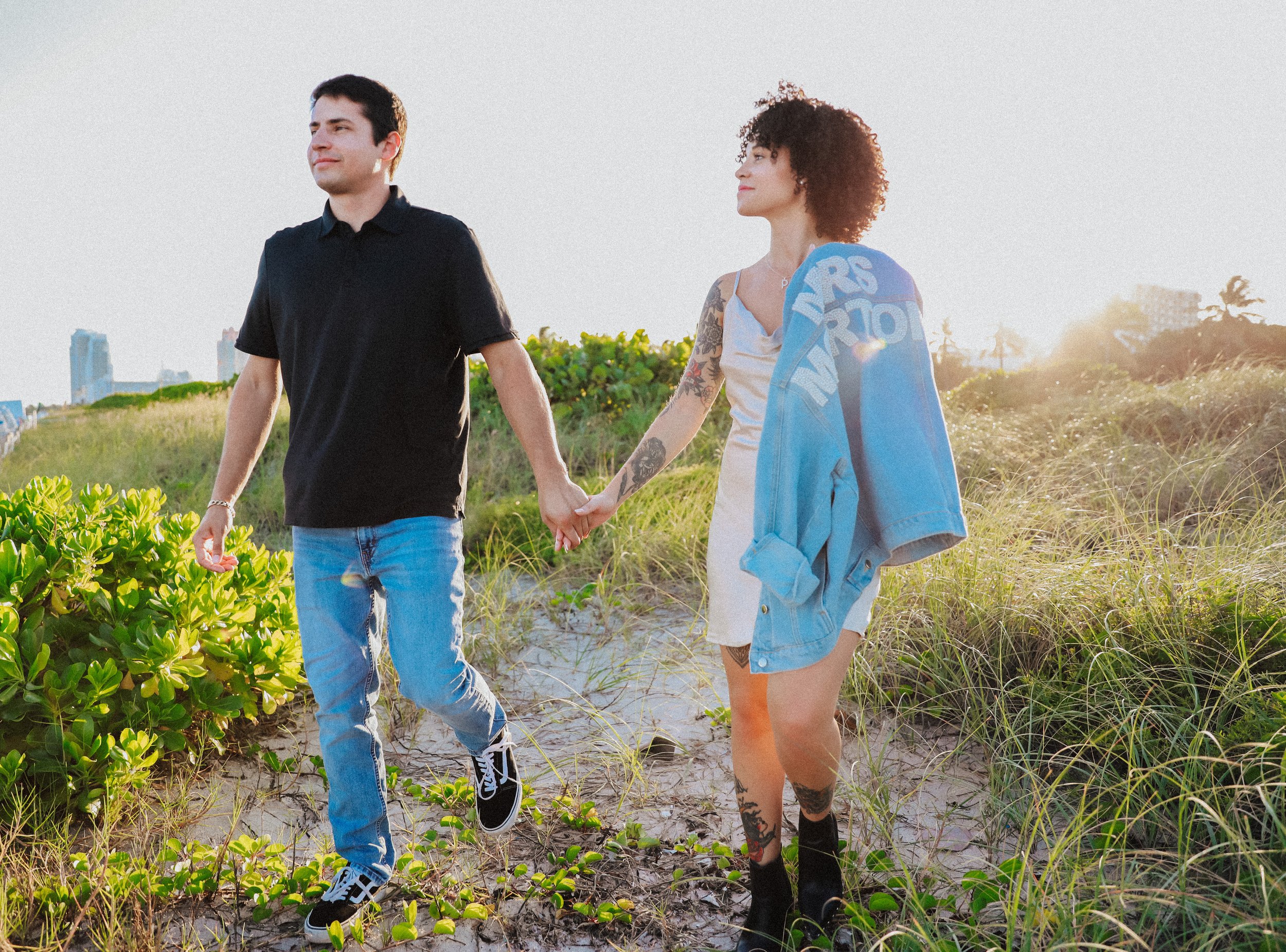 Romantic engagement photo with soft sunlight