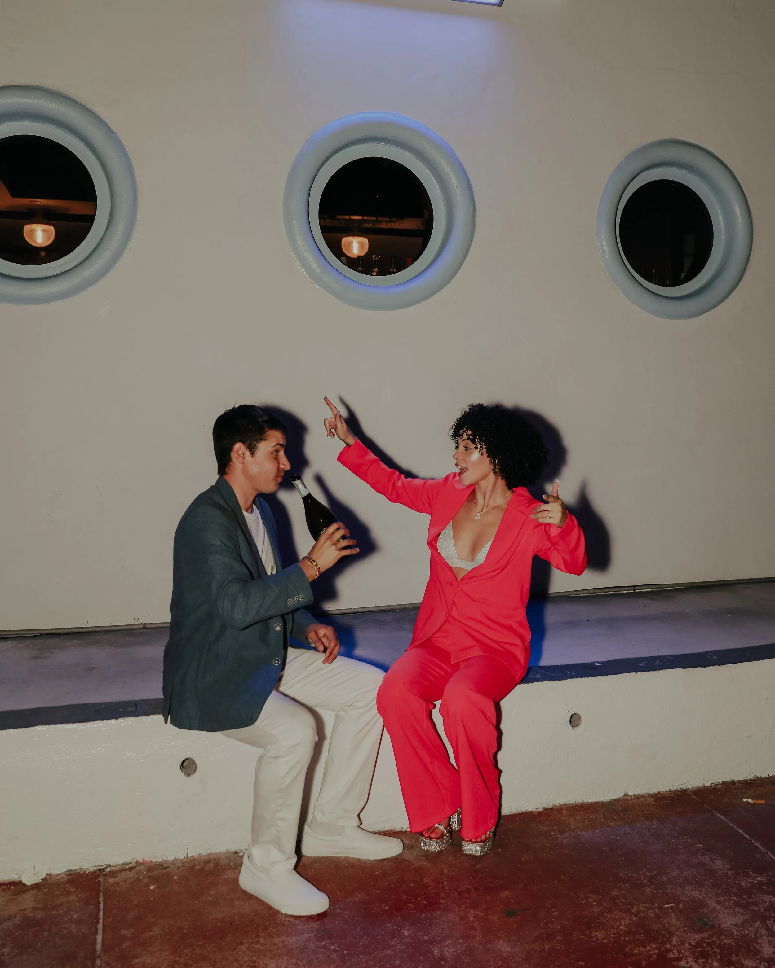 Couple laughing and interacting during engagement session