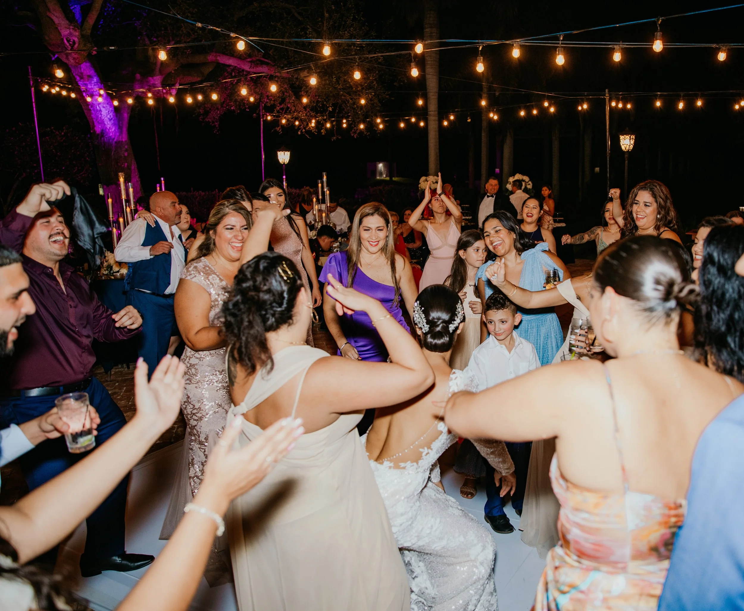 Groom celebrating with champagne during wedding reception