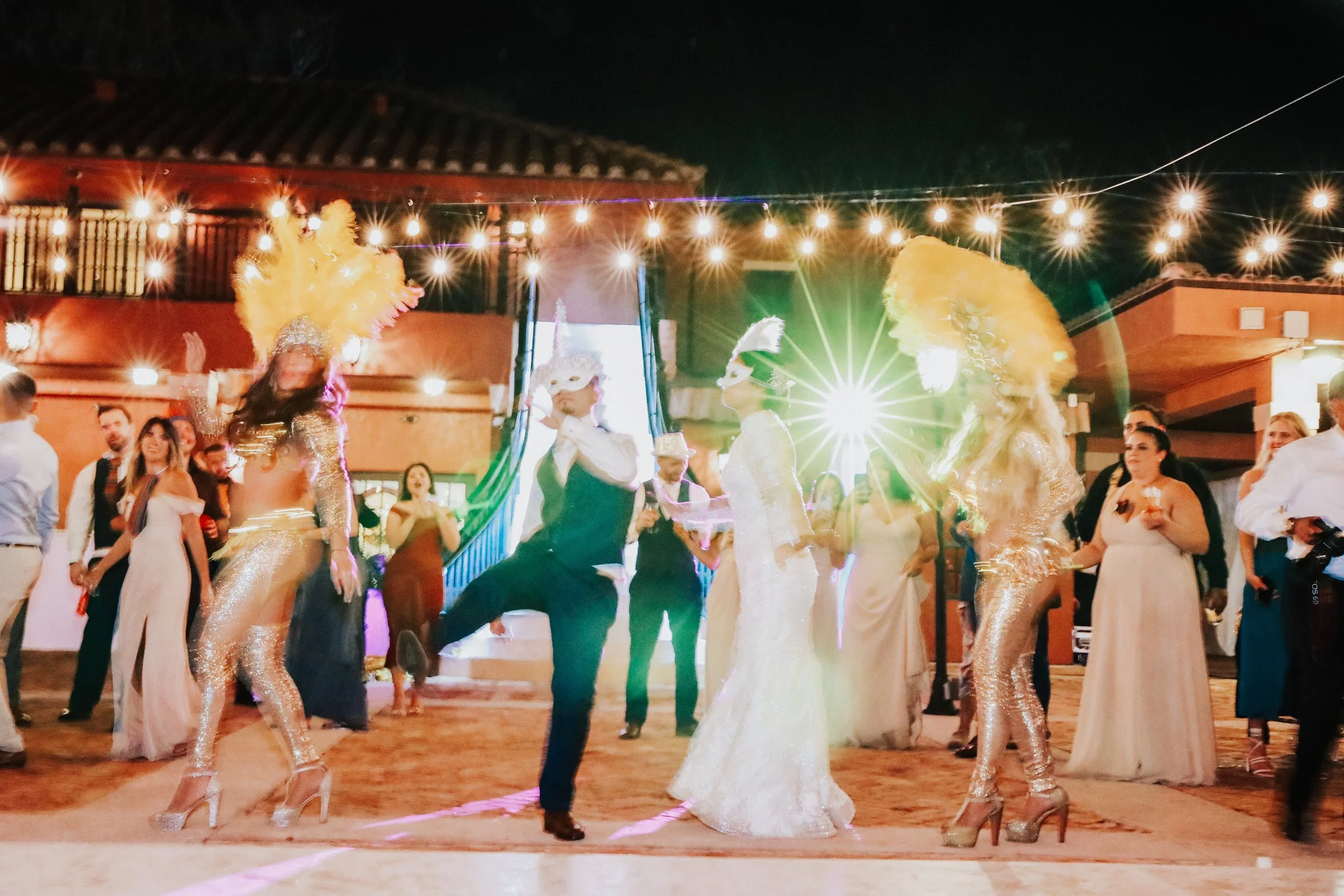 Fun wedding party with champagne spray and dancing