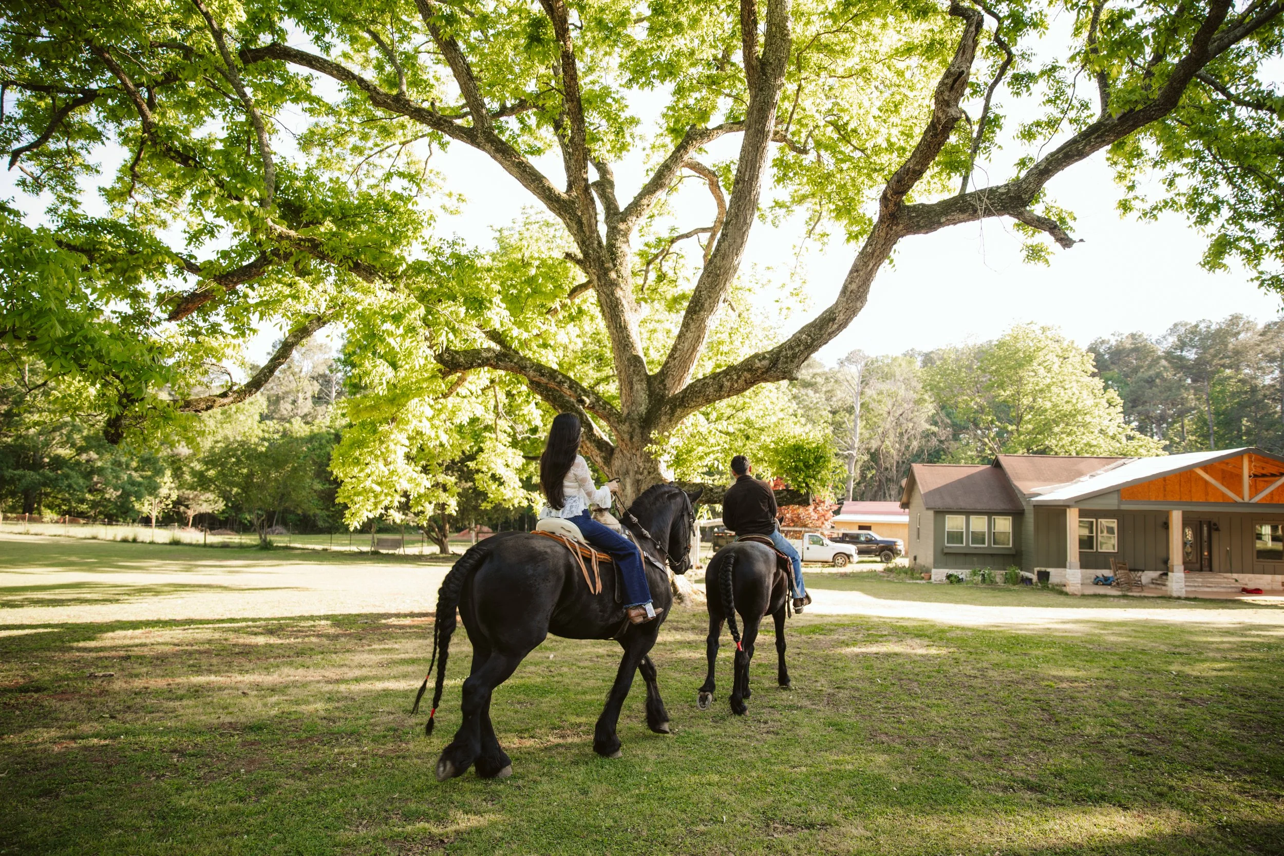 Horseback riding couple at Rancho Benitez