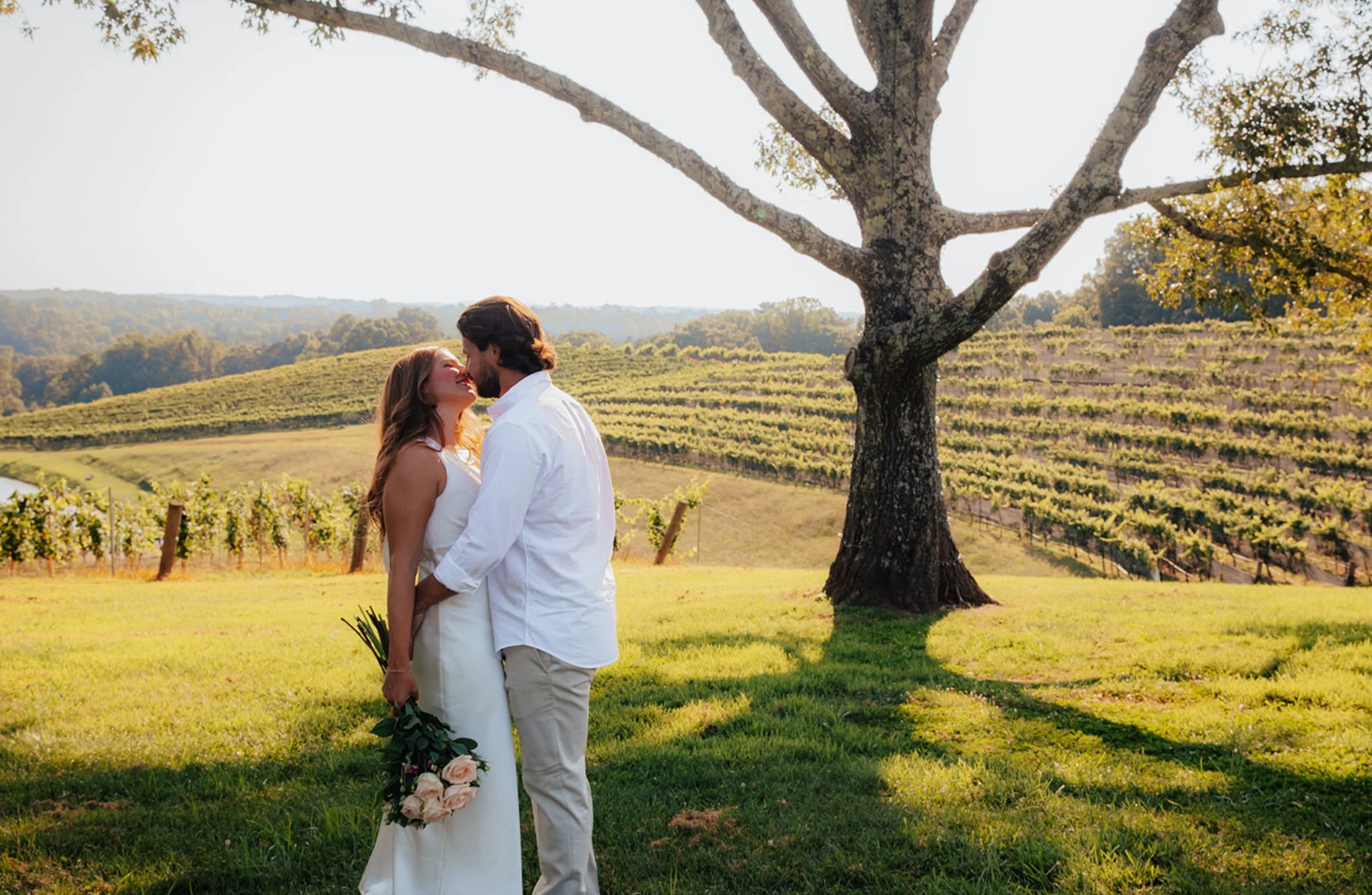 couple elopement portrait at Montaluce Winery vineyard overlook in Georgia