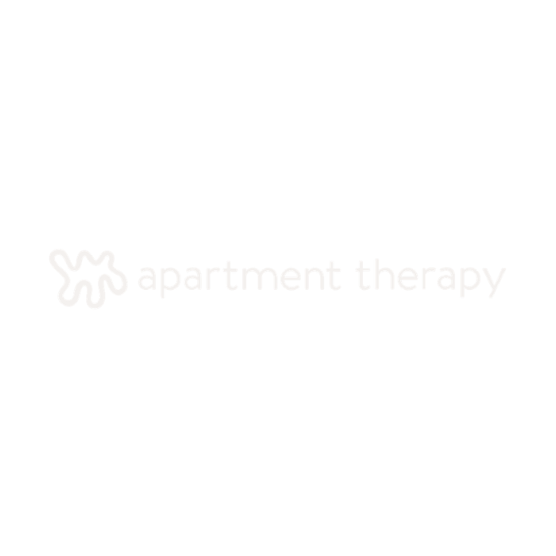 Logo of Apartment Therapy with abstract star shape and the words 'apartment therapy' in lowercase letters.