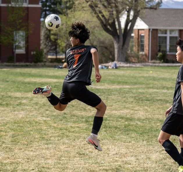 Soccer player doing kick behind back
