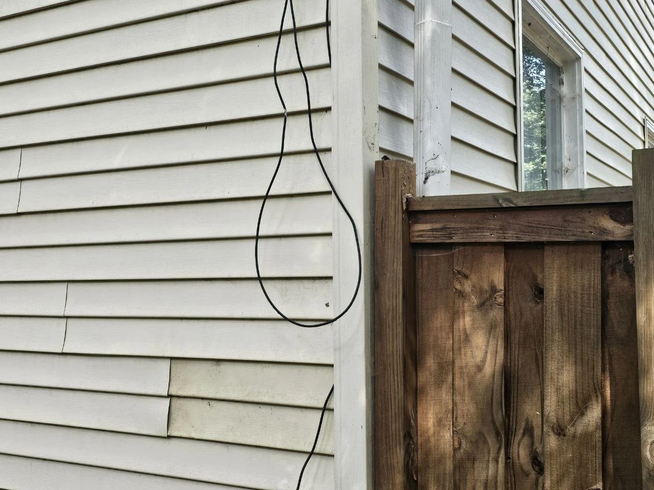What Causes Siding to Crack, Warp, or Fade?