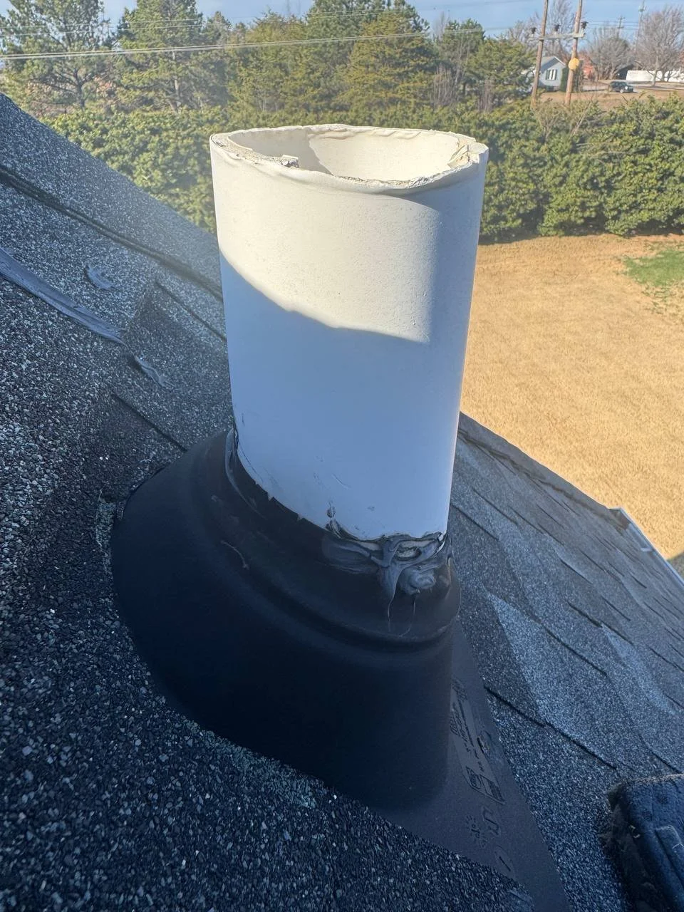 oof pipe boot sealing a plumbing vent to prevent water leaks.
