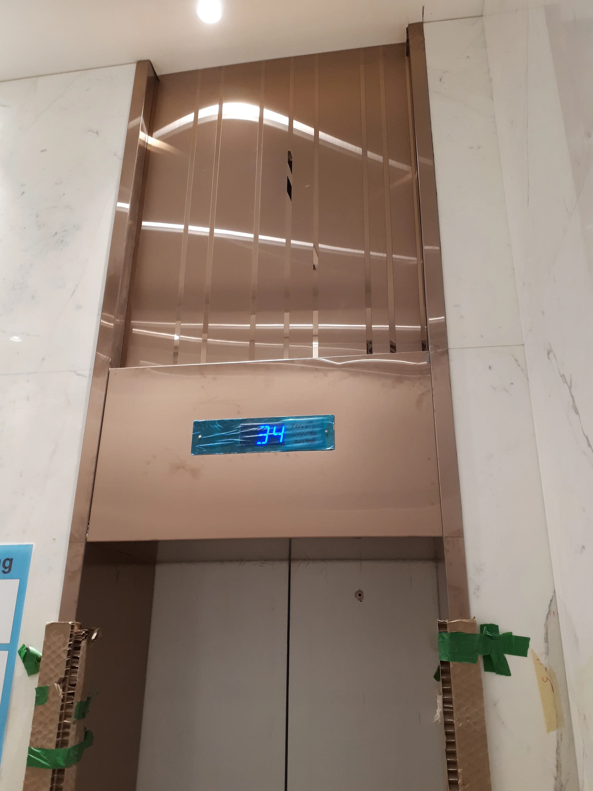 Bronze Elevator Panels completed.jpeg
