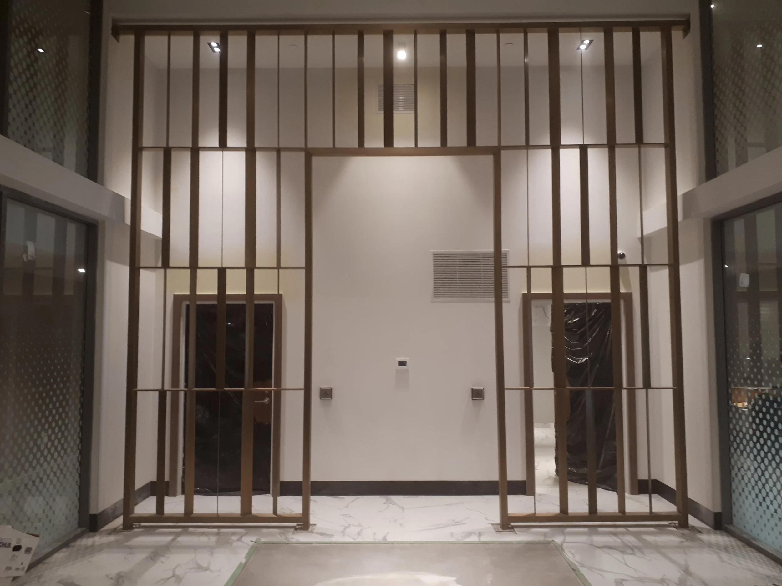 Bronze Wall at theater vestibule.jpeg