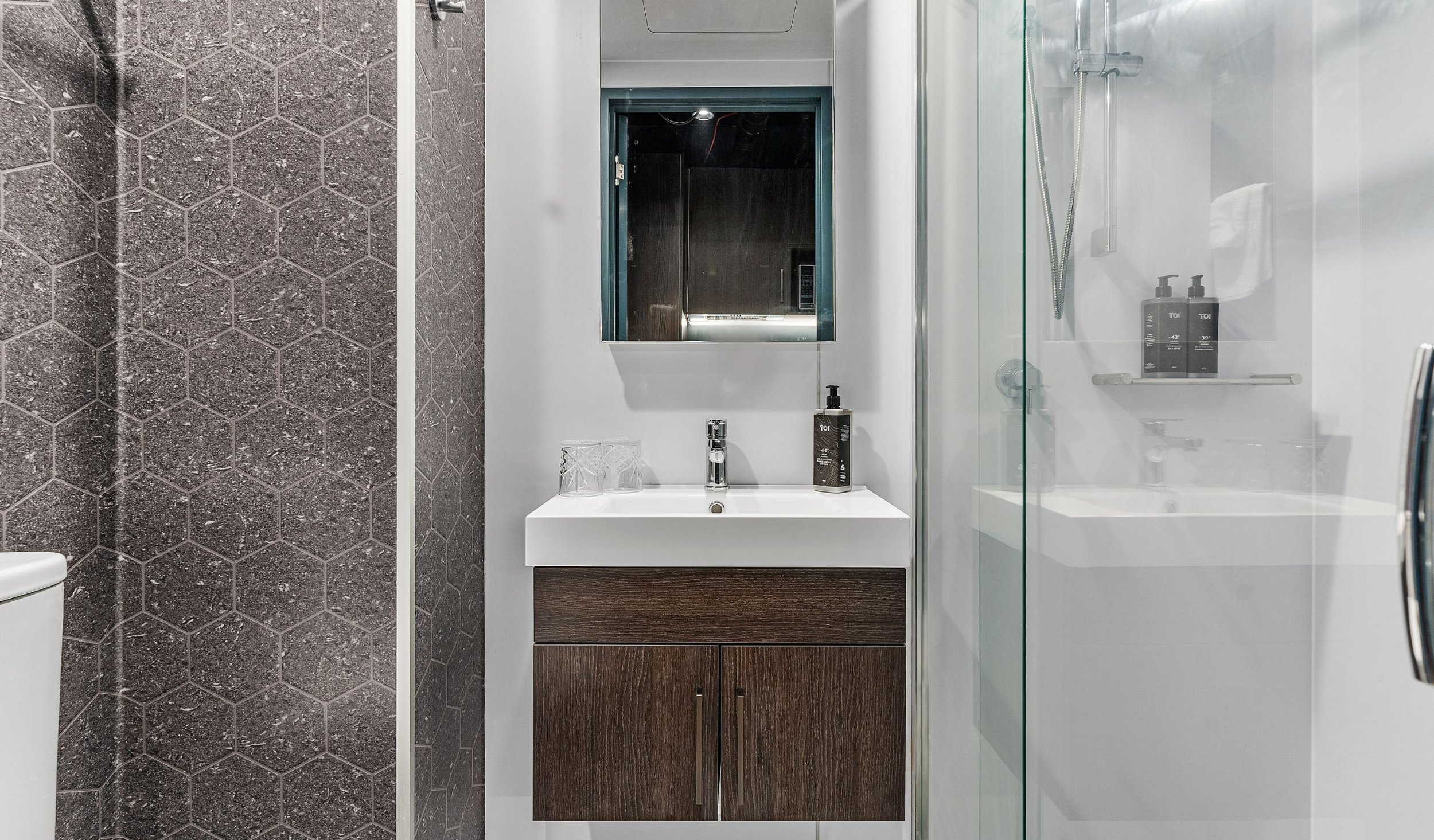 Interior of Studio room bathroom at Abstract Residence in Auckland's CBD