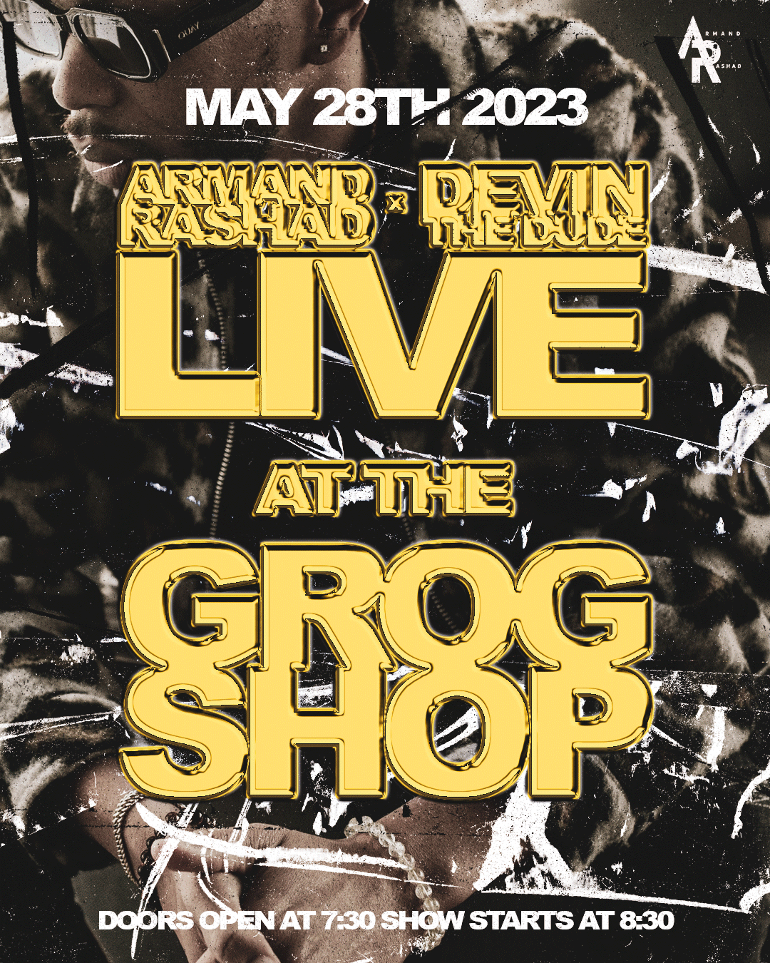 Promotional poster for a live music event at the Grogg Shop on May 28th, 2023, featuring Armand Rashad and Devn. The poster has a dark background with bold yellow text and includes event details like doors opening at 7:30 and the show starting at 8:3
