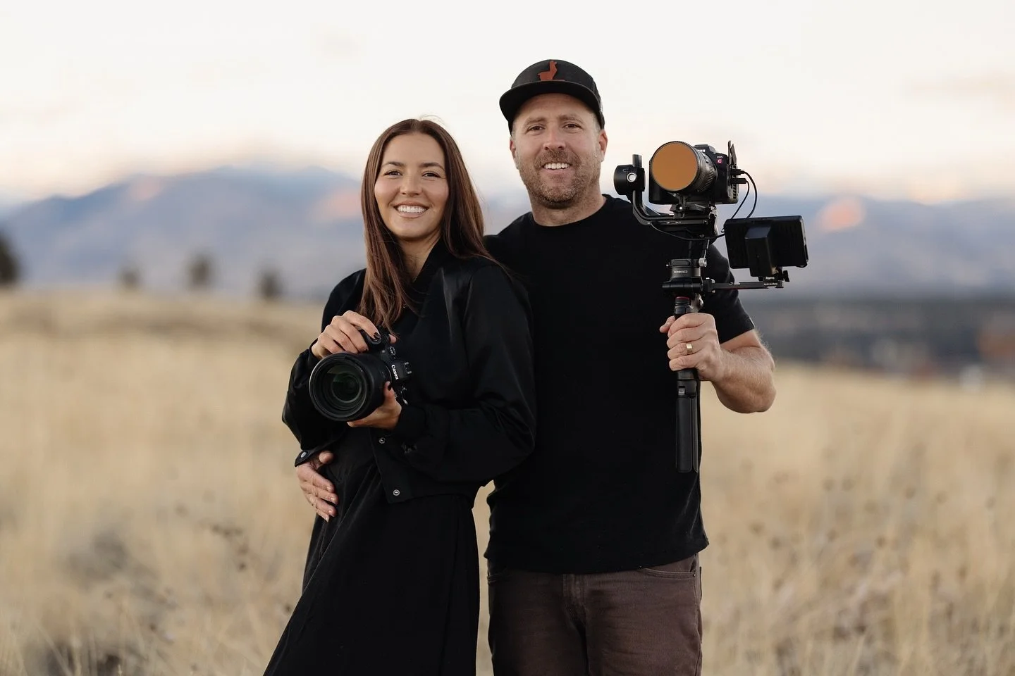 We’re Mady and Tyler - a husband and wife photo & video team. We have been capturing weddings for almost 8 years! 
When we’re not behind the camera we love to mountain bike, ski, soak up the sun, and enjoy the quiet moments that make