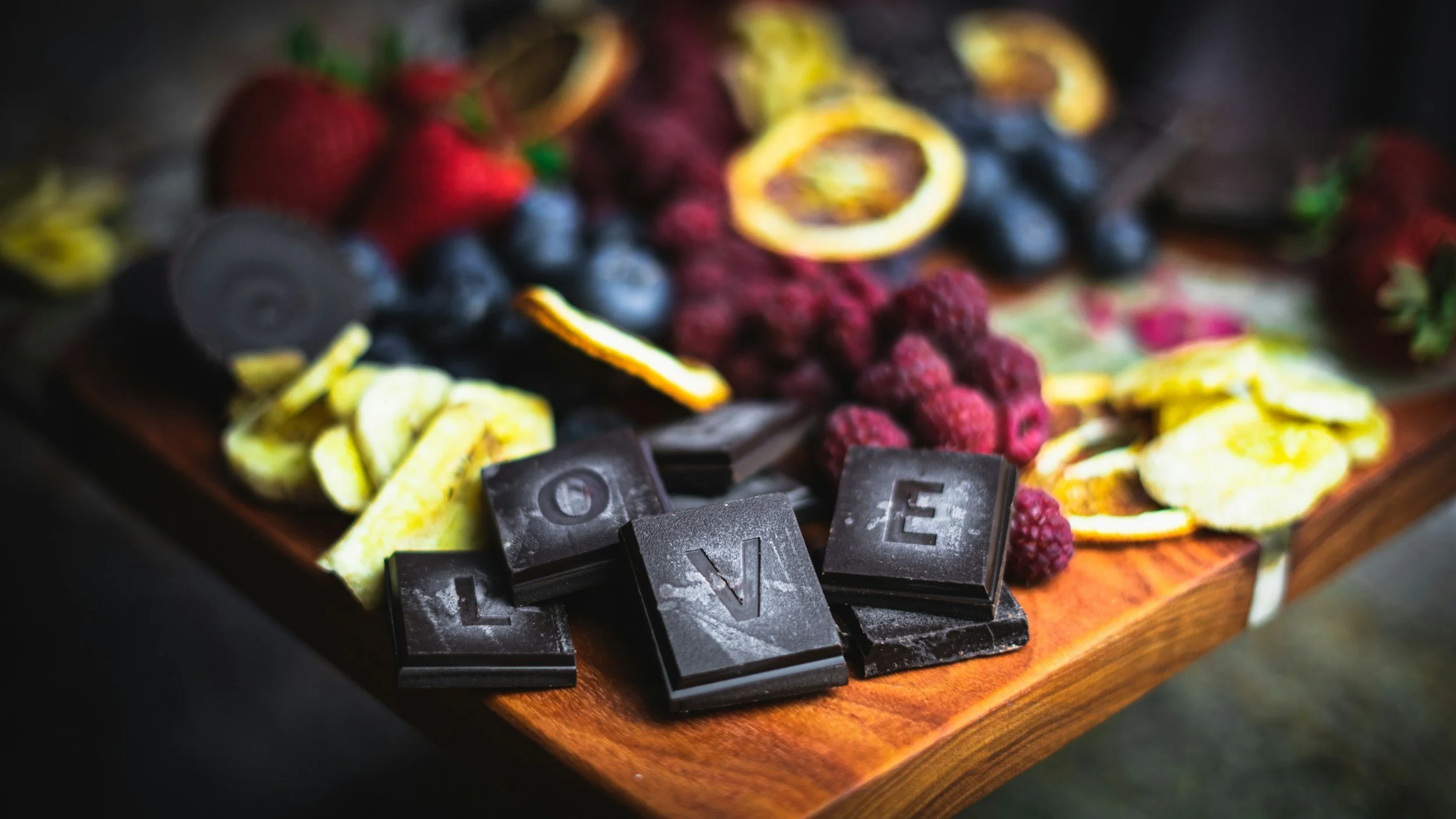 Chocolate with assorted berry fruit on a board delivery across the Horowhenua.