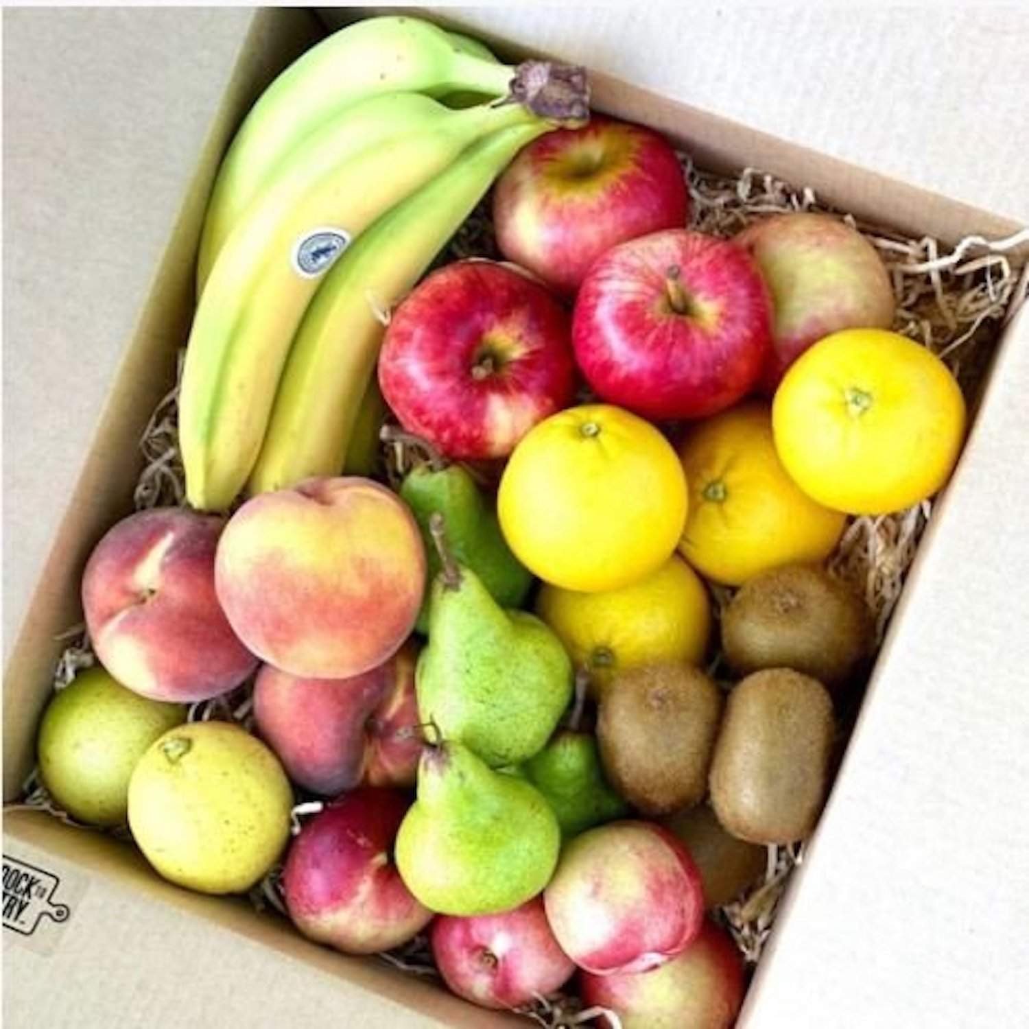 Fresh mixed fruit tray hamper, elegantly arranged with seasonal fruit, available for delivery in Levin by Horowhenua Hampers.