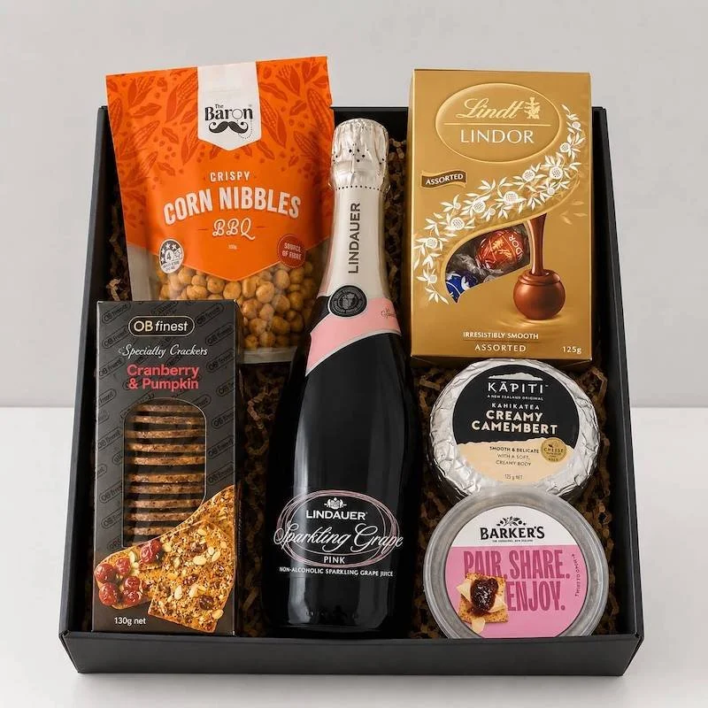 Gift box with cheese, fruit paste, chcoolates, corn nibbles and gourmet crackers available for same-day delivery Levin.