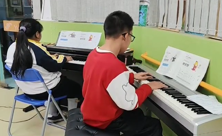 Virtual Piano Class Special Needs School Guangxi, CHINA
