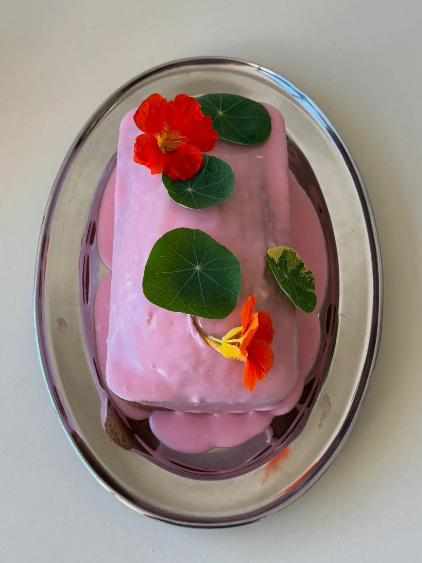 Vanilla &amp; Tonka bean loaf cake w/ fresh raspberry icing &amp; nasturtiums