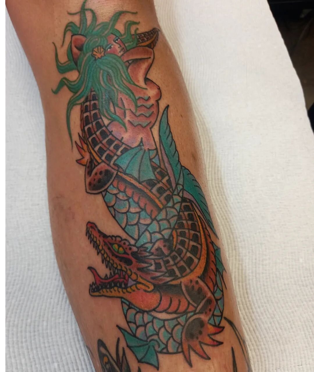 Mermaid and crocodile for Tom. Thanks again dude for the fun session and laughs. Done at @mans_ruin_tattoo.  Books open.