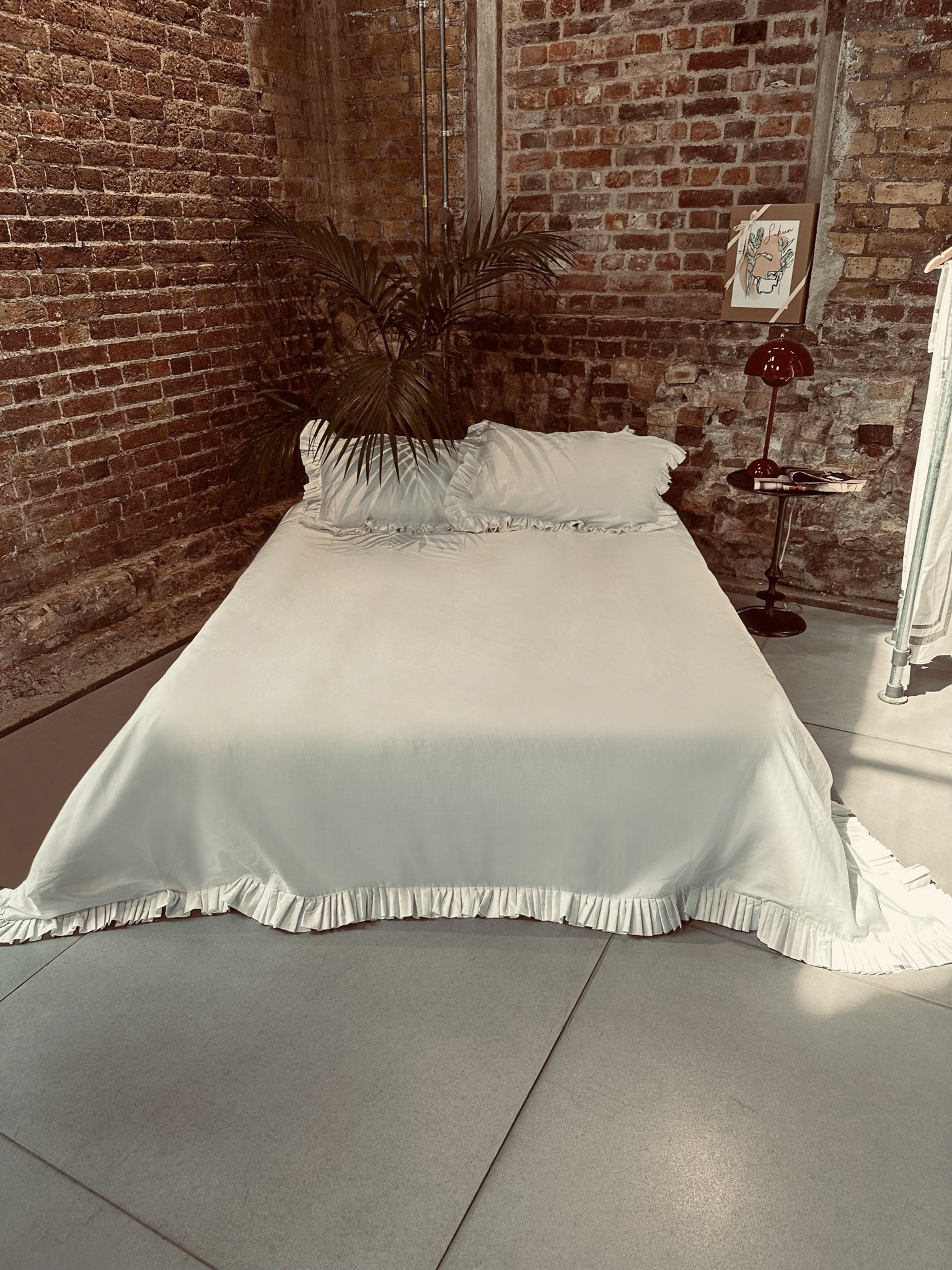 The Vienna bed bundle with an elegant ruffle trim, luxurious cotton