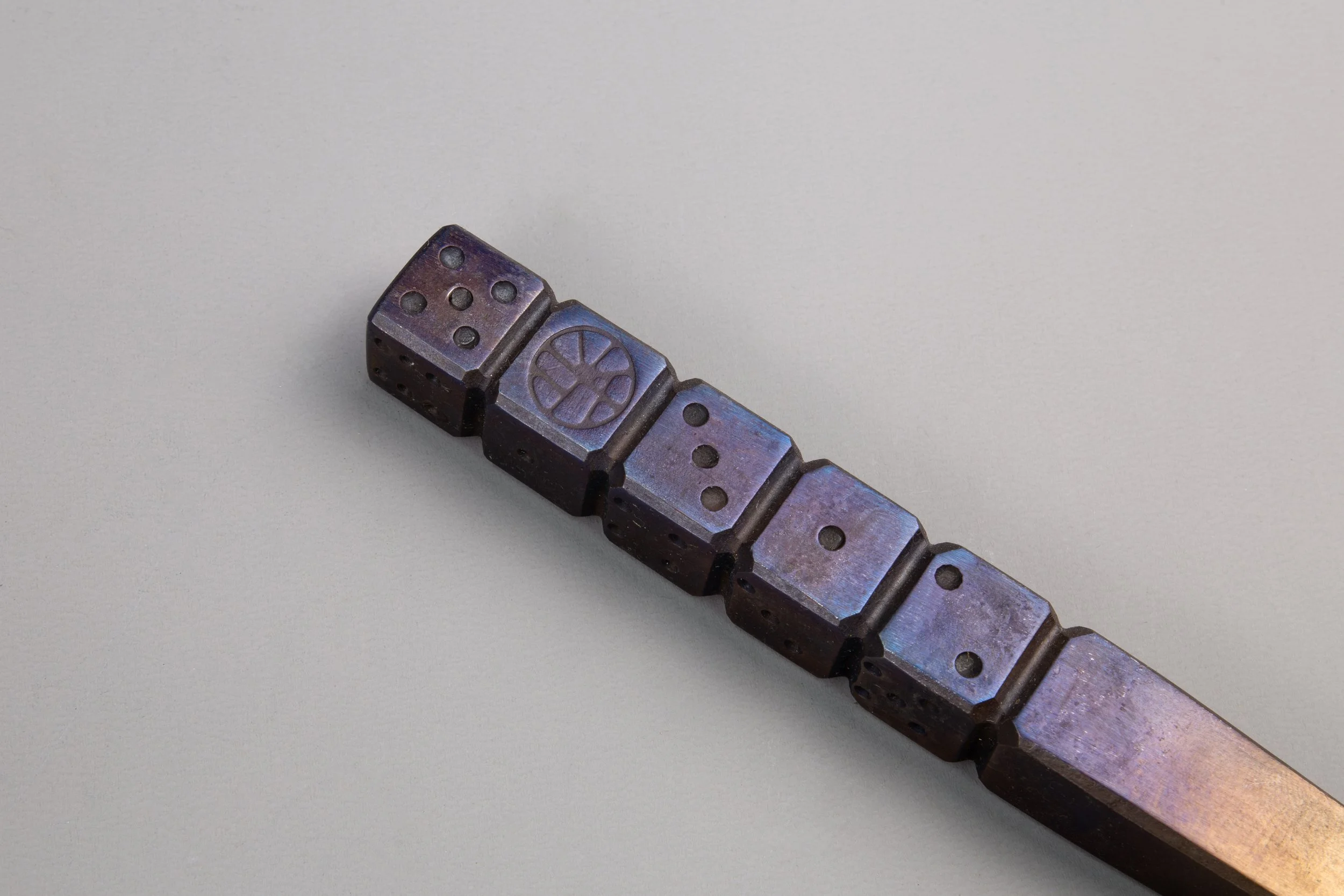 Close up of dice style centre dot