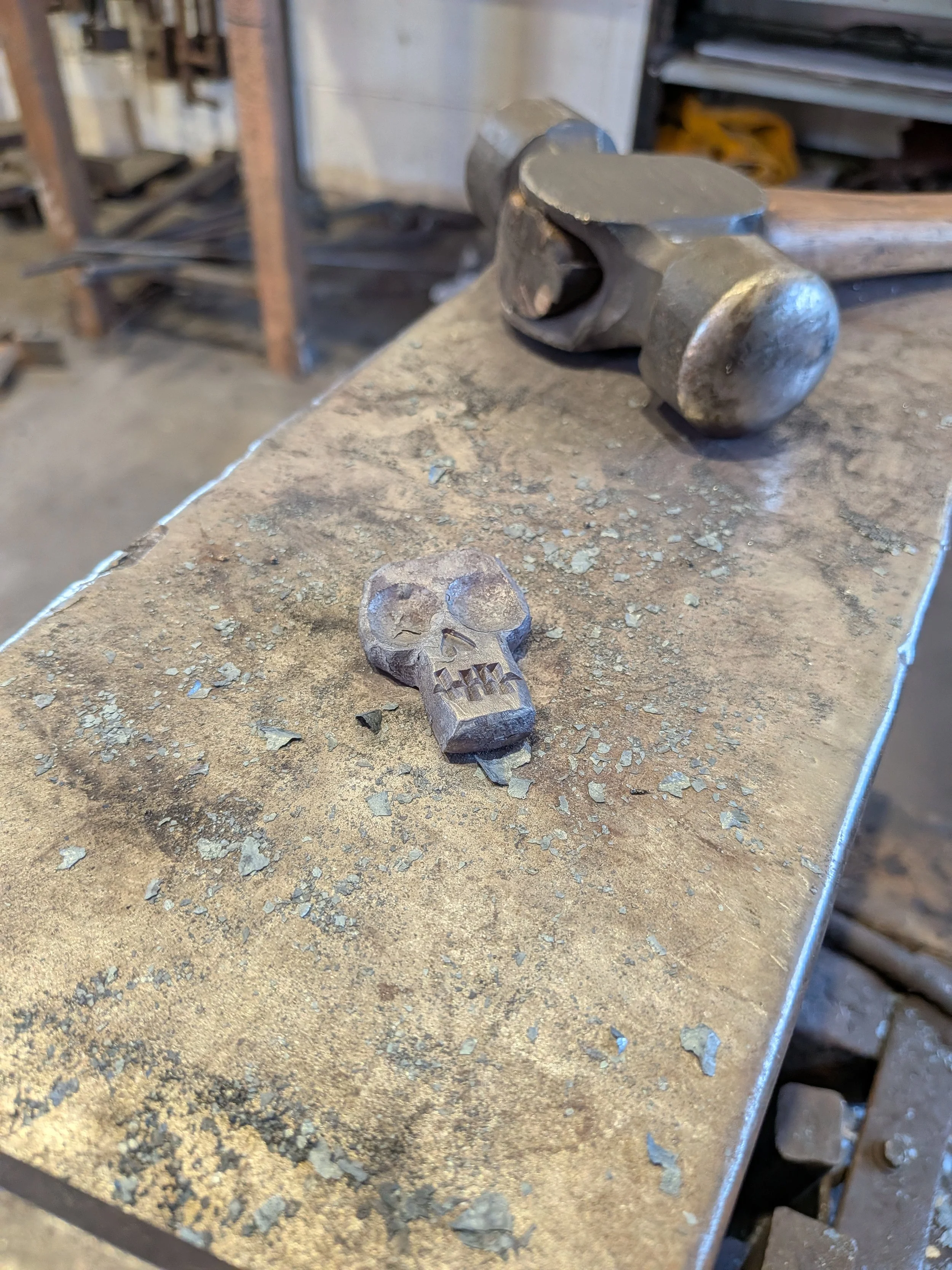 a hand forged skull keyring
