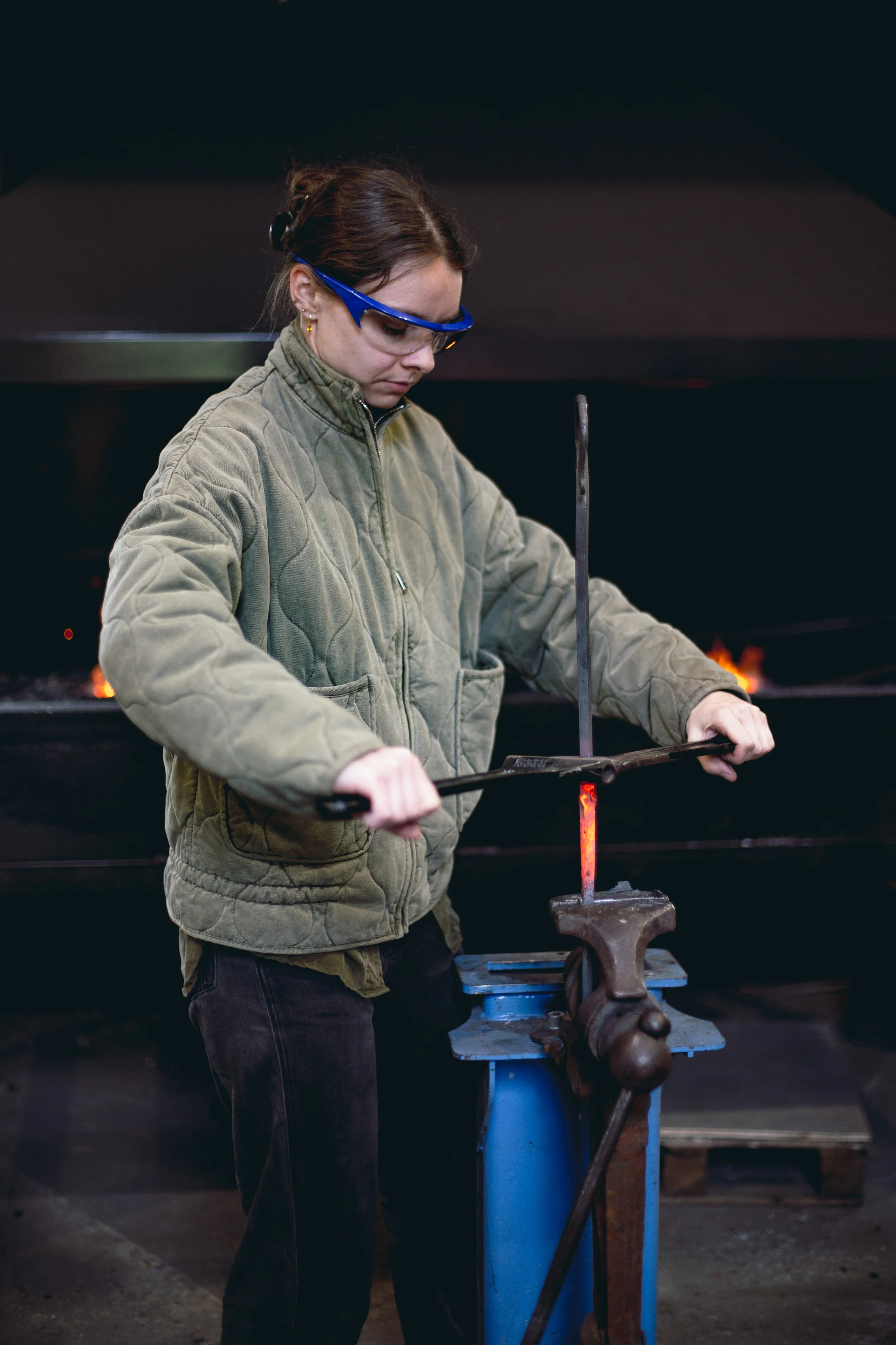 Private blacksmithing class twisting steel