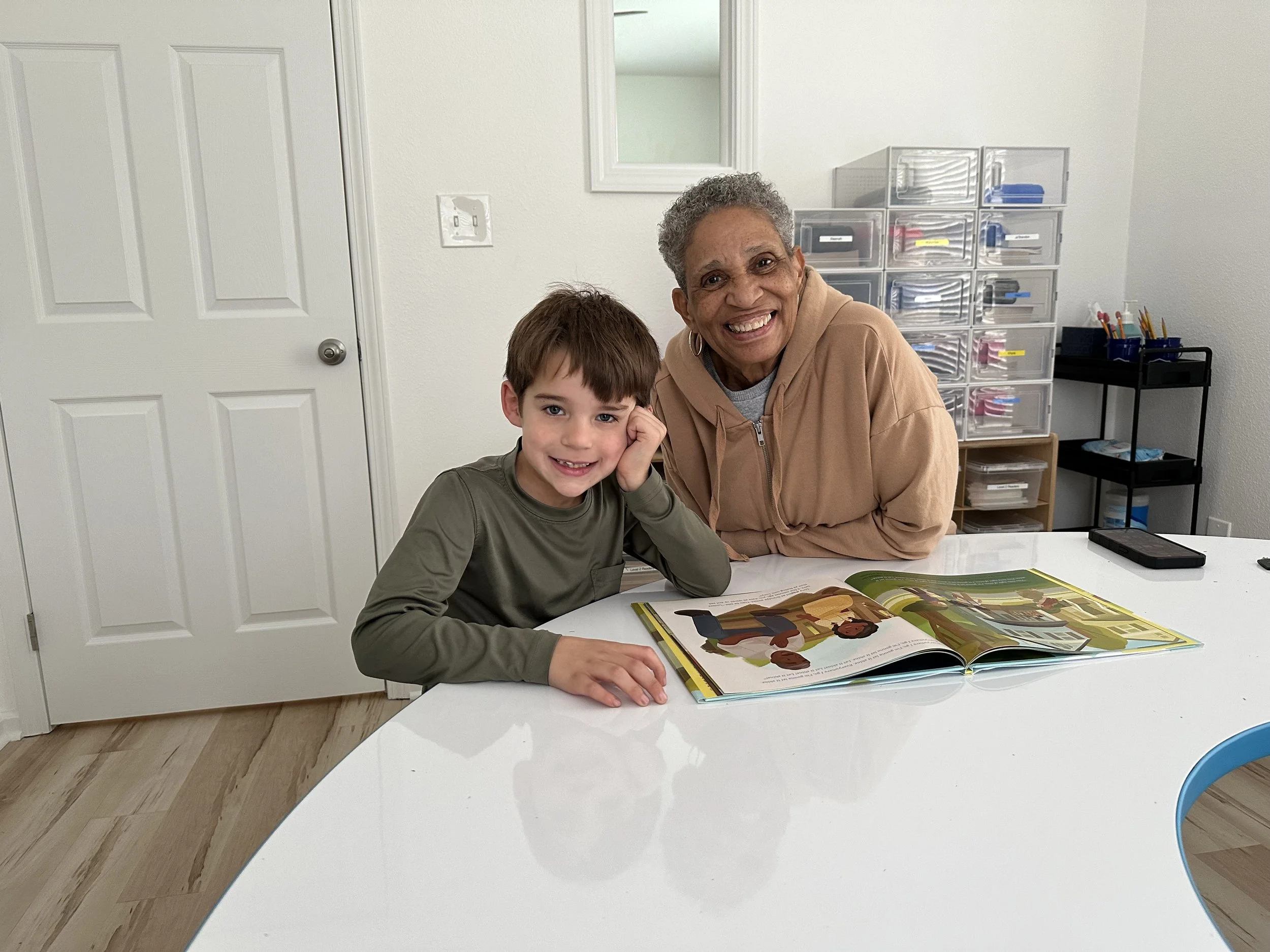 Ms. Judy reading with Brantley