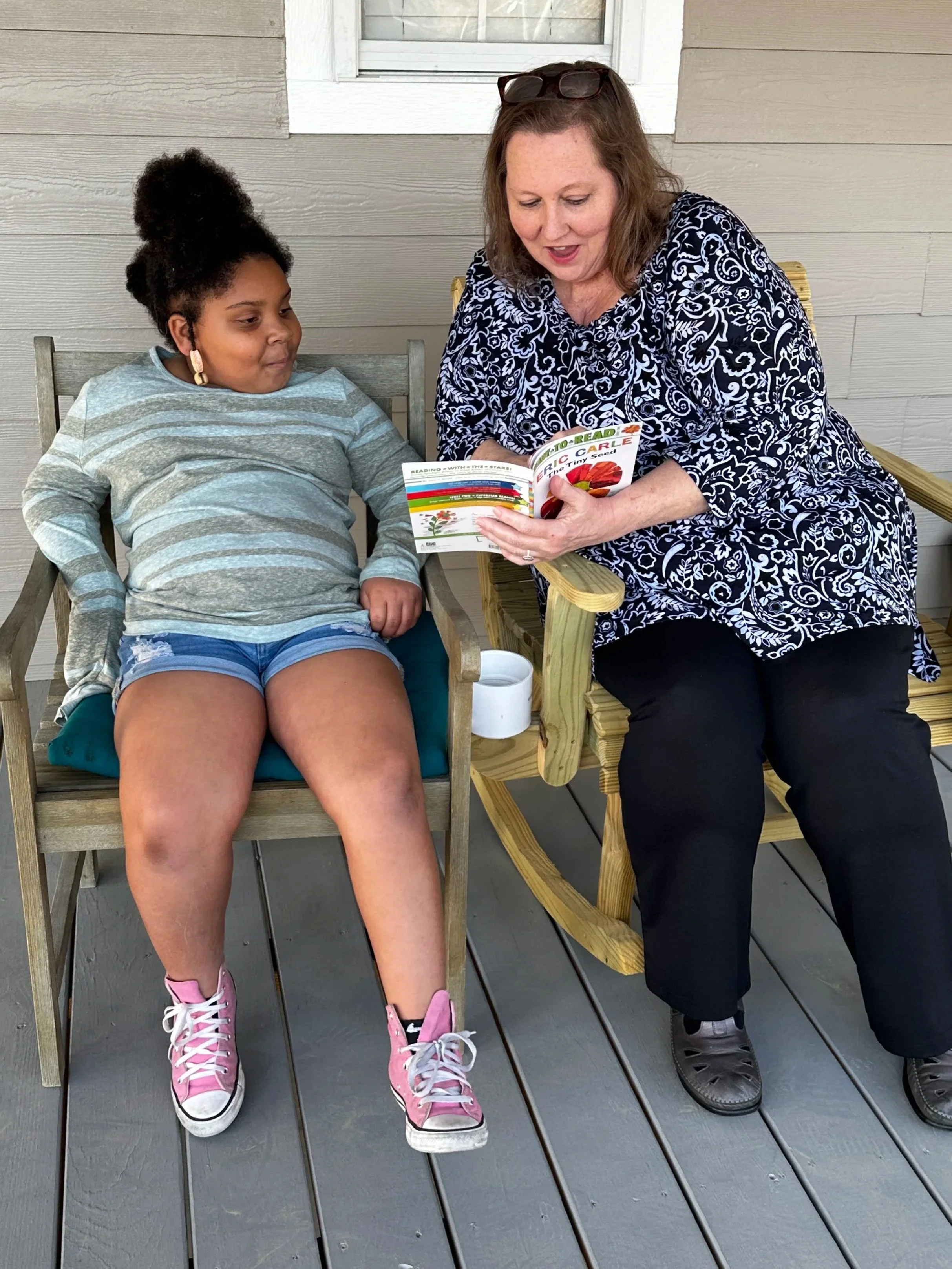 Rocking and reading with Jovi and Ms. Melissa!